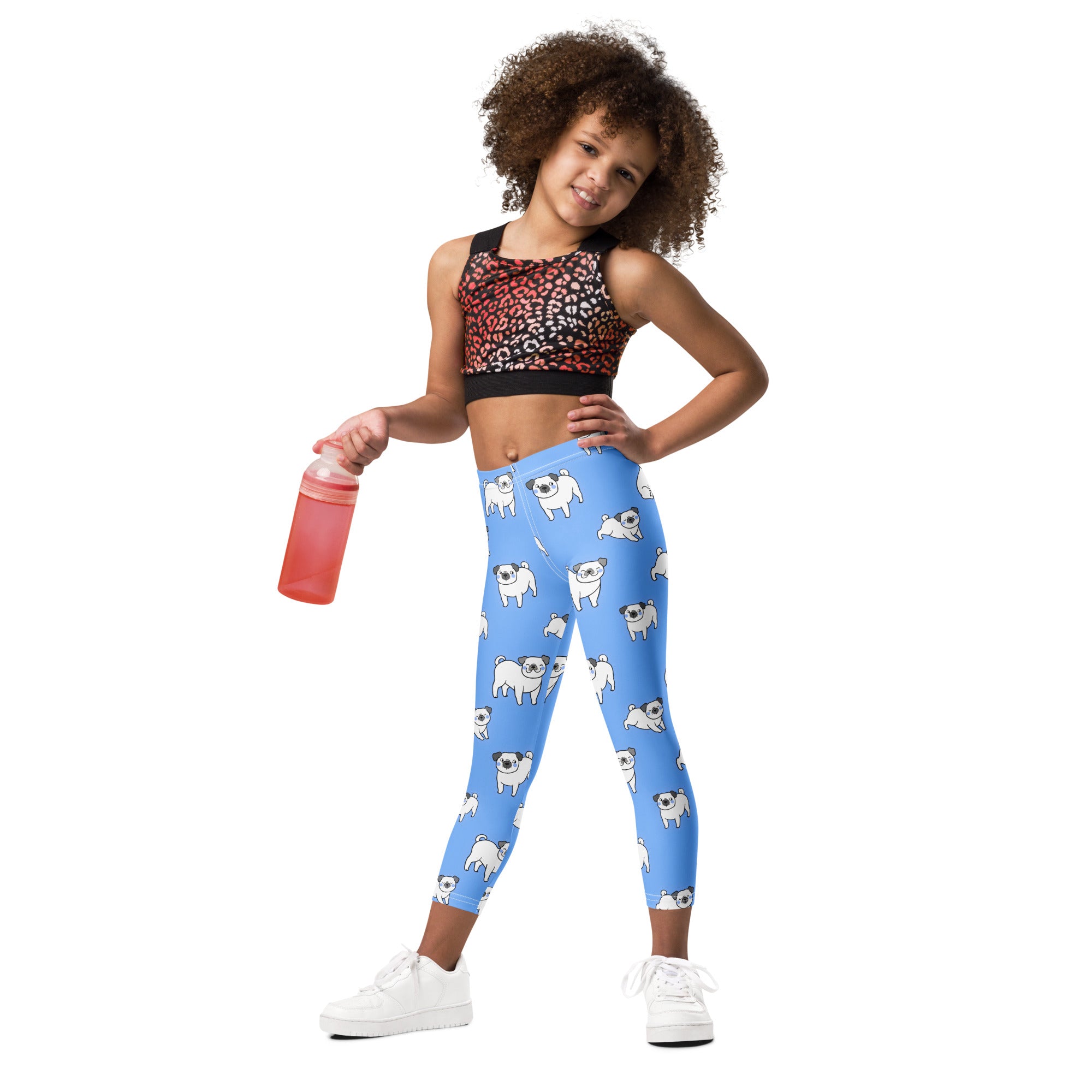 Kids blue buttery soft leggings with a playful white pug dog pattern perfect for everyday wear