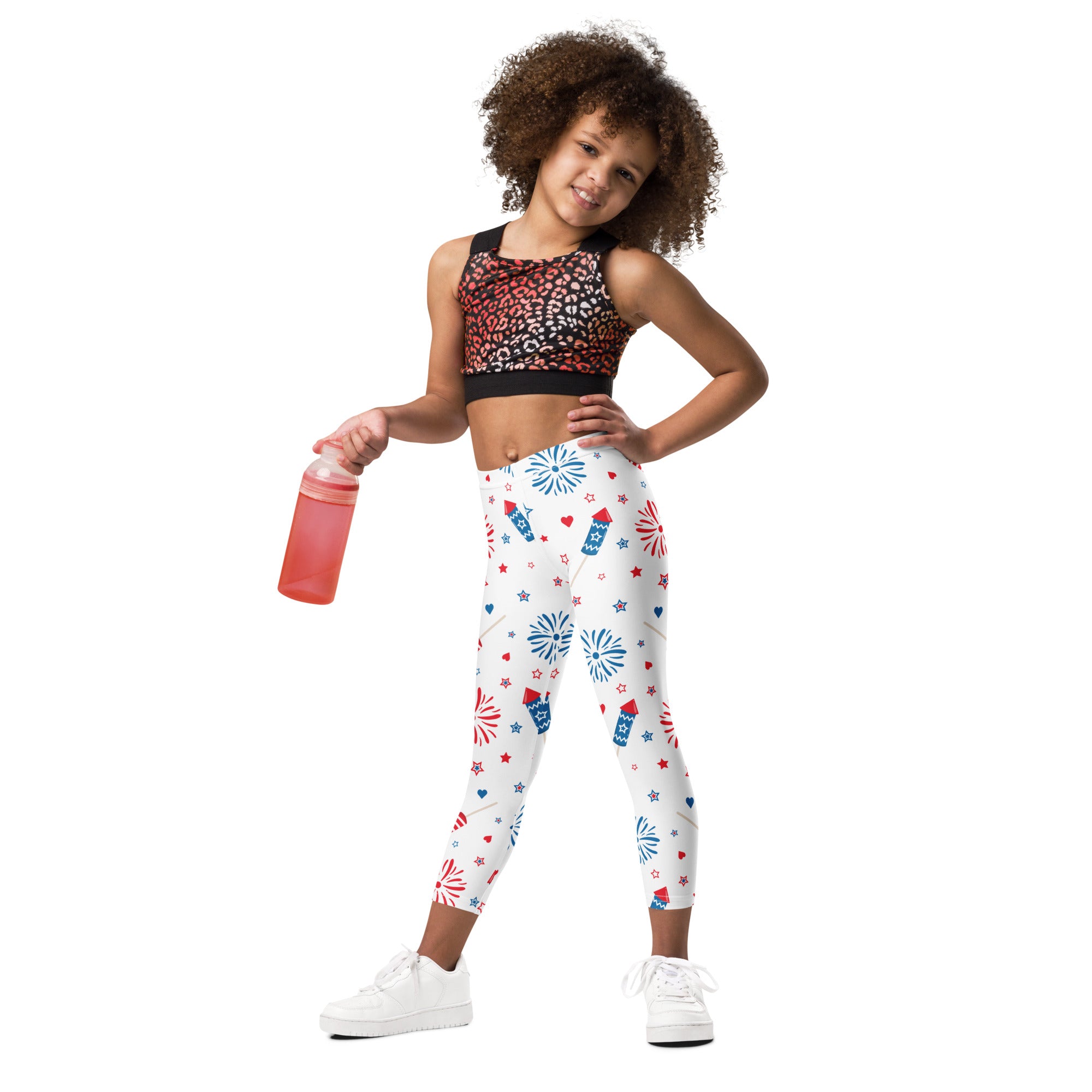 White buttery soft kids leggings with red white and blue fireworks stars and rocket ships patriotic pattern