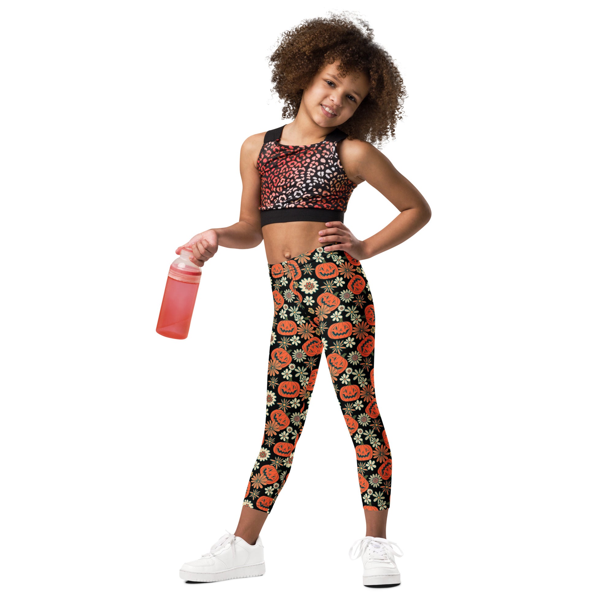 Kids vintage halloween pumpkin floral buttery soft black leggings with orange jack o lanterns and white flowers