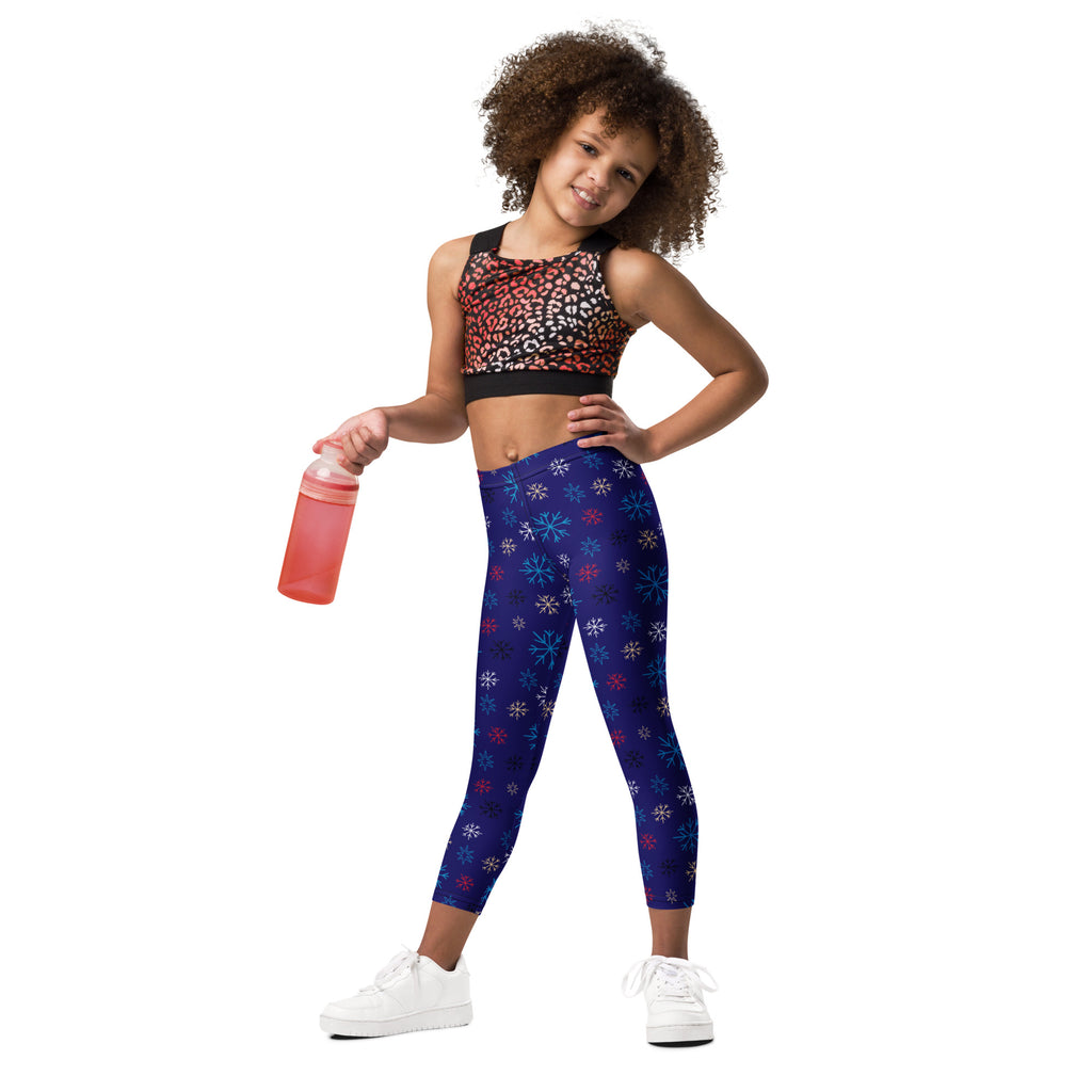 Kids buttery soft blue leggings with colorful snowflake pattern perfect for winter wear
