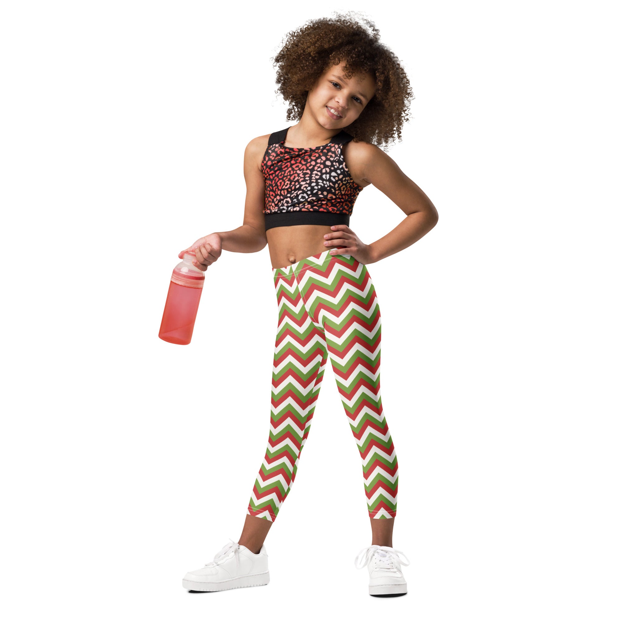 Kids christmas chevron buttery soft leggings in red green and white with a chevron pattern for festive wear