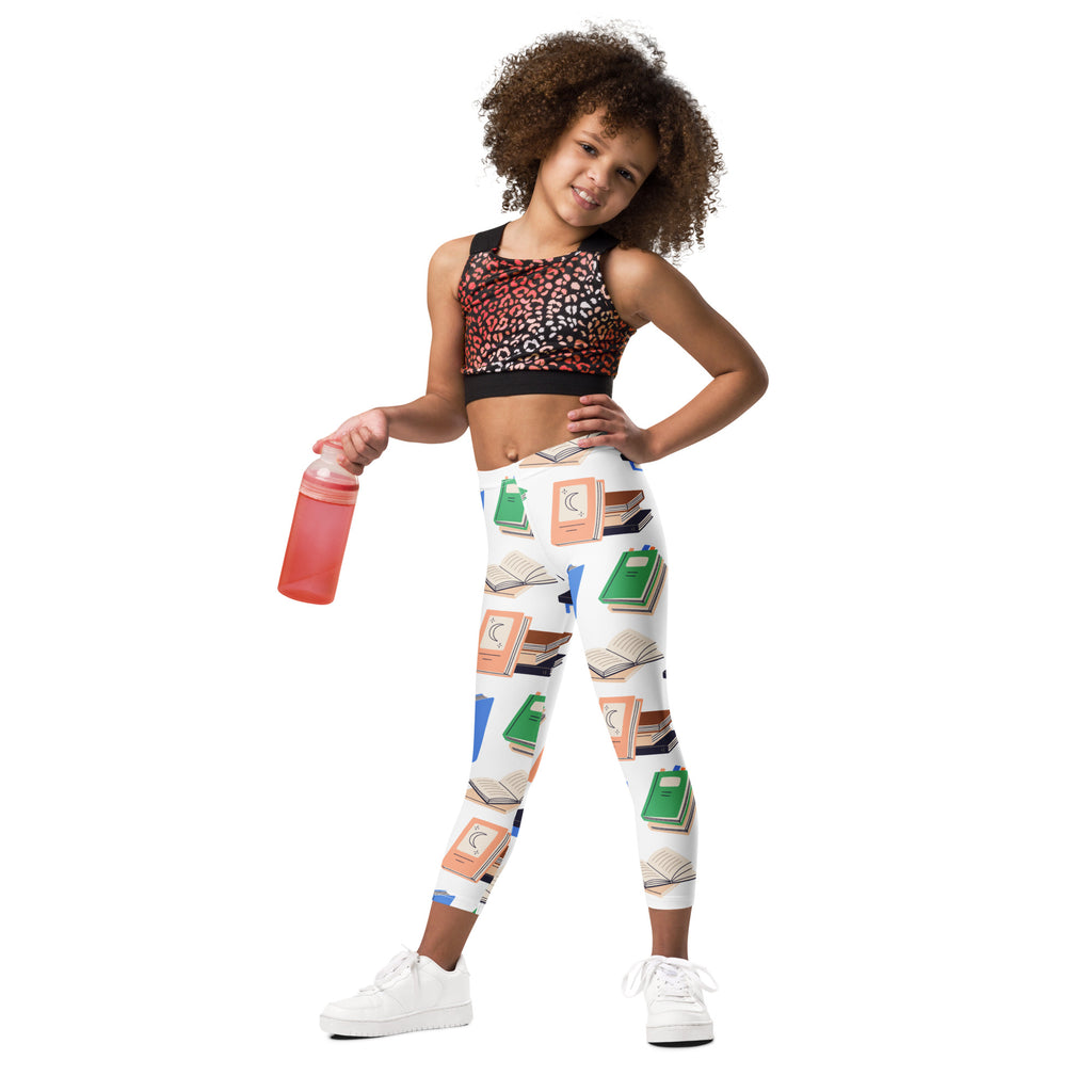 White kids leggings with colorful book and open page pattern made of buttery soft fabric for comfortable wear