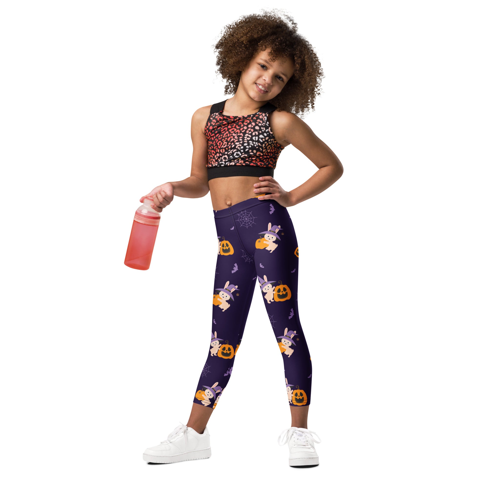Girls halloween bunny buttery soft leggings in purple with cartoon bunnies in witch hats and orange pumpkins on dark fabric