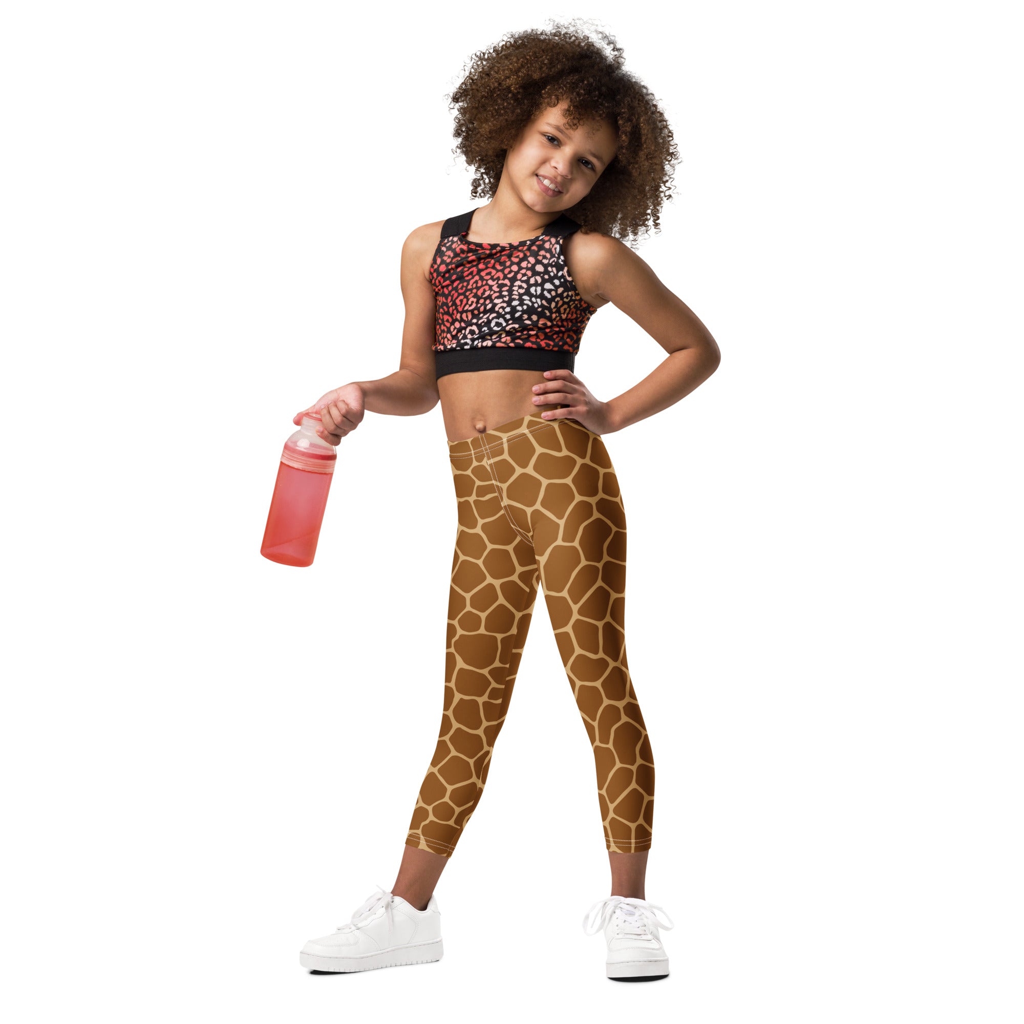 Kids giraffe print buttery soft leggings in tan and brown with stretchy form fitting design