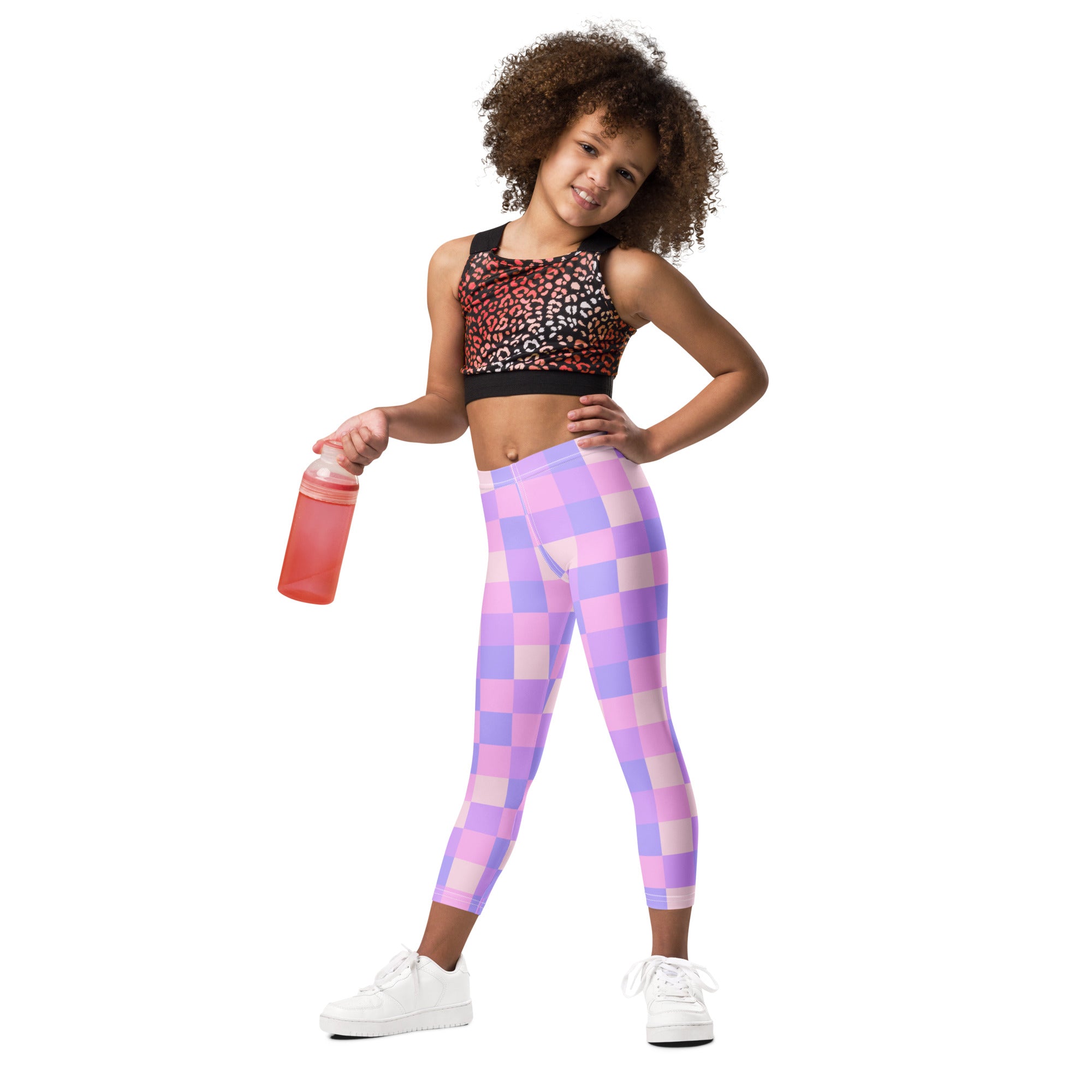 Girls purple checkered buttery soft leggings in pink and purple with a comfortable stretchy fit