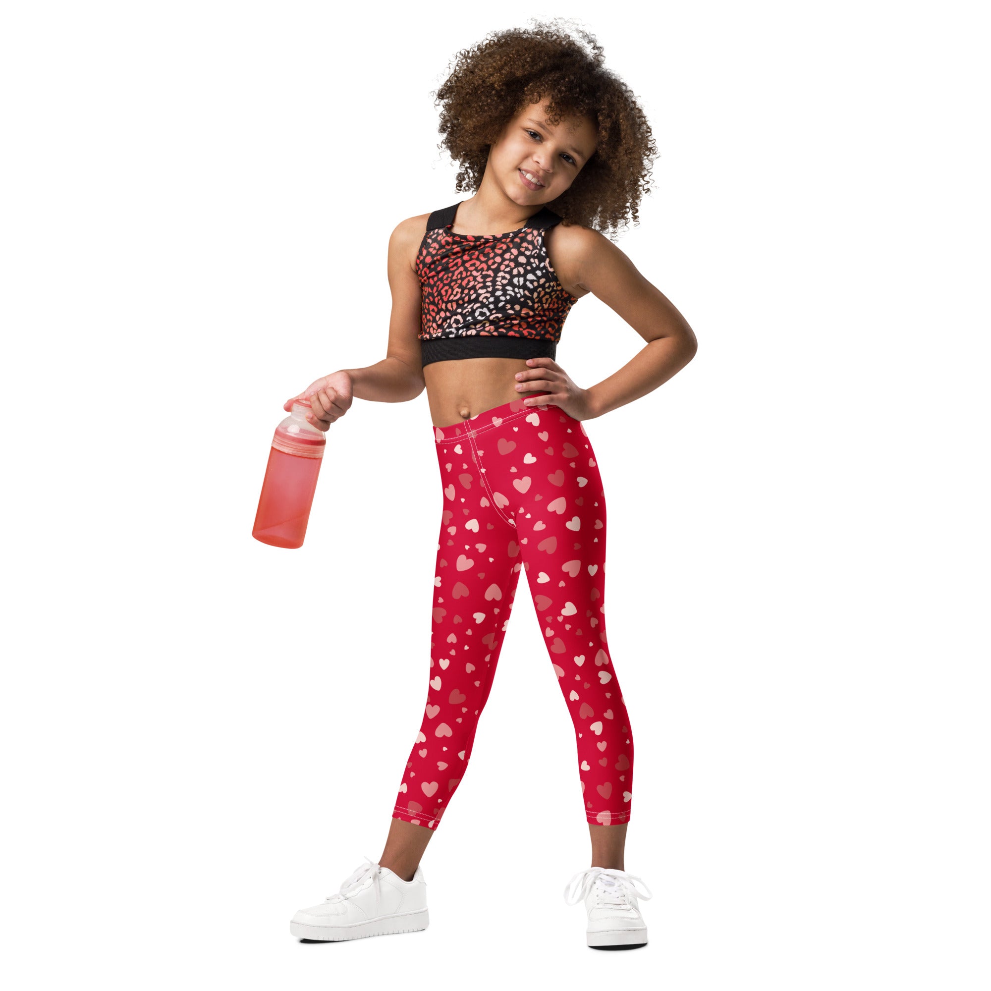 Girls red heart print buttery soft leggings with stretchy form fitting design in vibrant red color