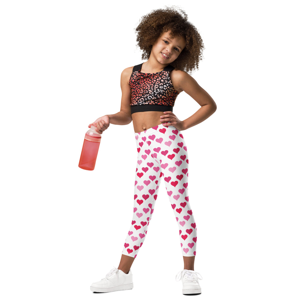 Girls Valentine’s Day white leggings with pink heart pattern made from buttery soft fabric for comfortable wear