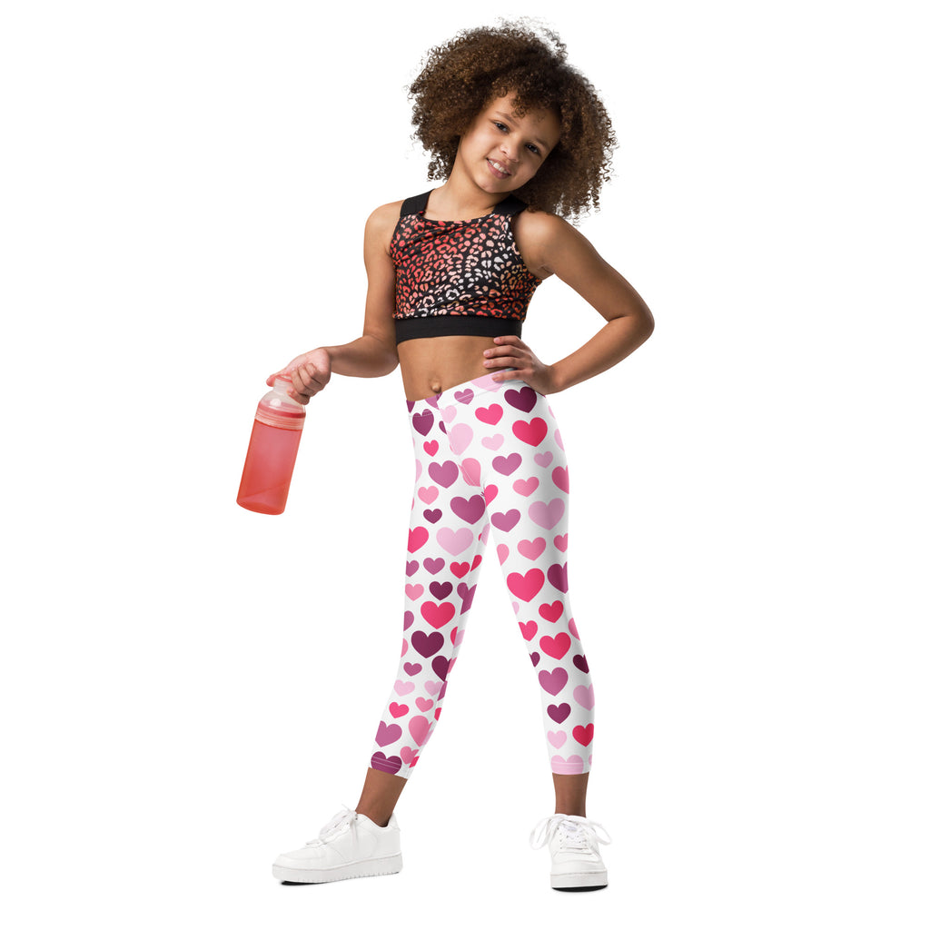 Girls purple and pink hearts buttery soft leggings featuring pink and white heart patterns for comfortable wear