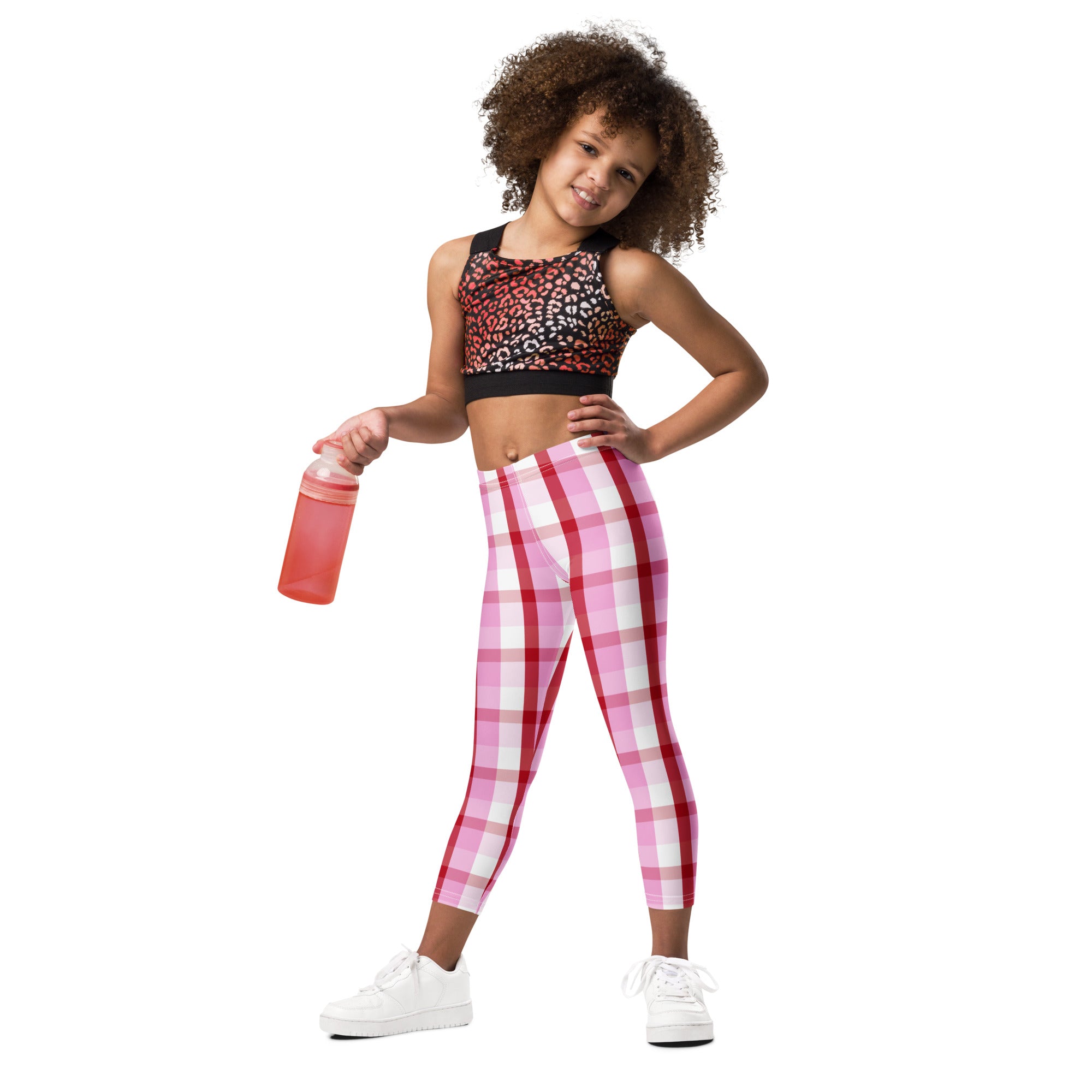 Girls pink and white plaid buttery soft leggings made from soft fabric perfect for comfortable wear