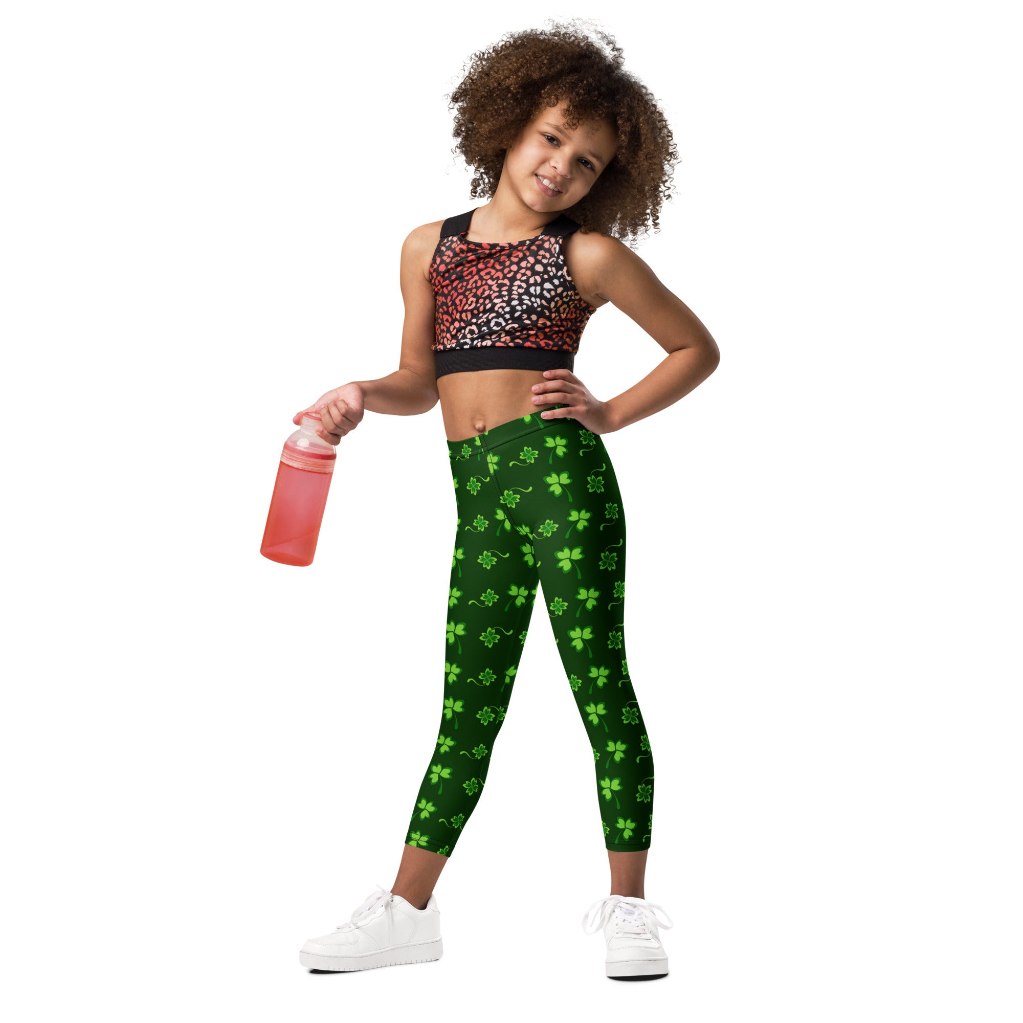 Girls green lucky clover buttery soft leggings featuring light green shamrocks all over the fabric