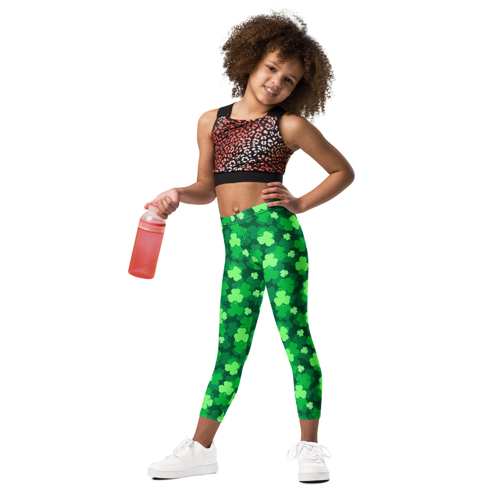 Girls emerald green shamrock buttery soft leggings featuring a green shamrock pattern and soft fabric