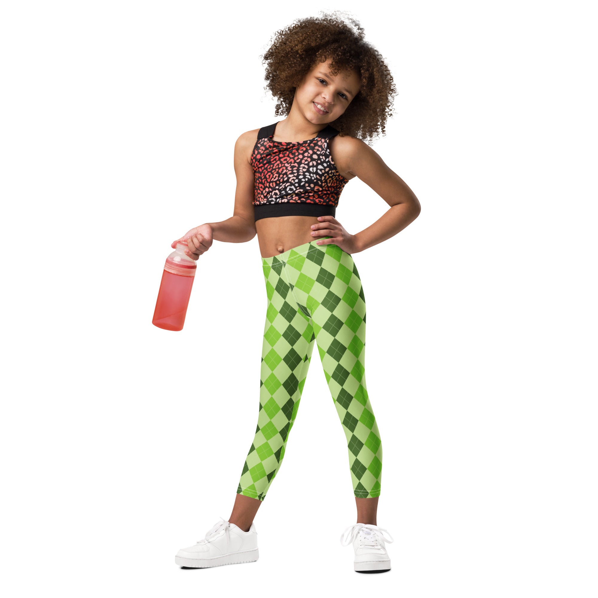 Girls light green argyle buttery soft leggings with green and black pattern made from soft comfortable fabric