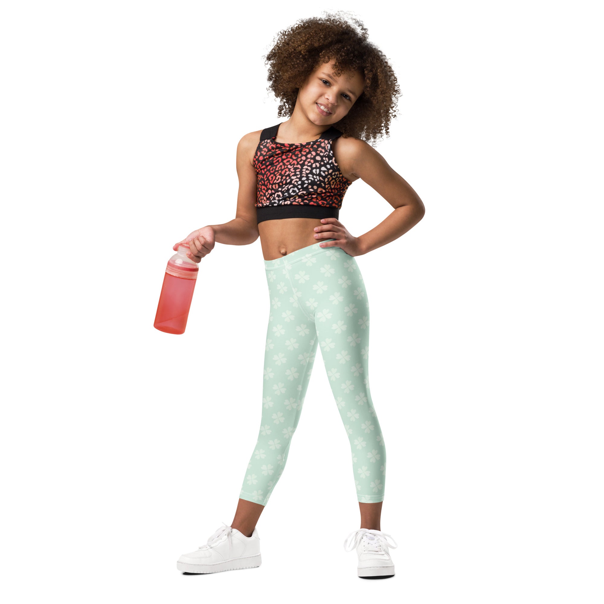 Girls mint shamrock buttery soft leggings in mint green with a subtle white star pattern for comfortable wear