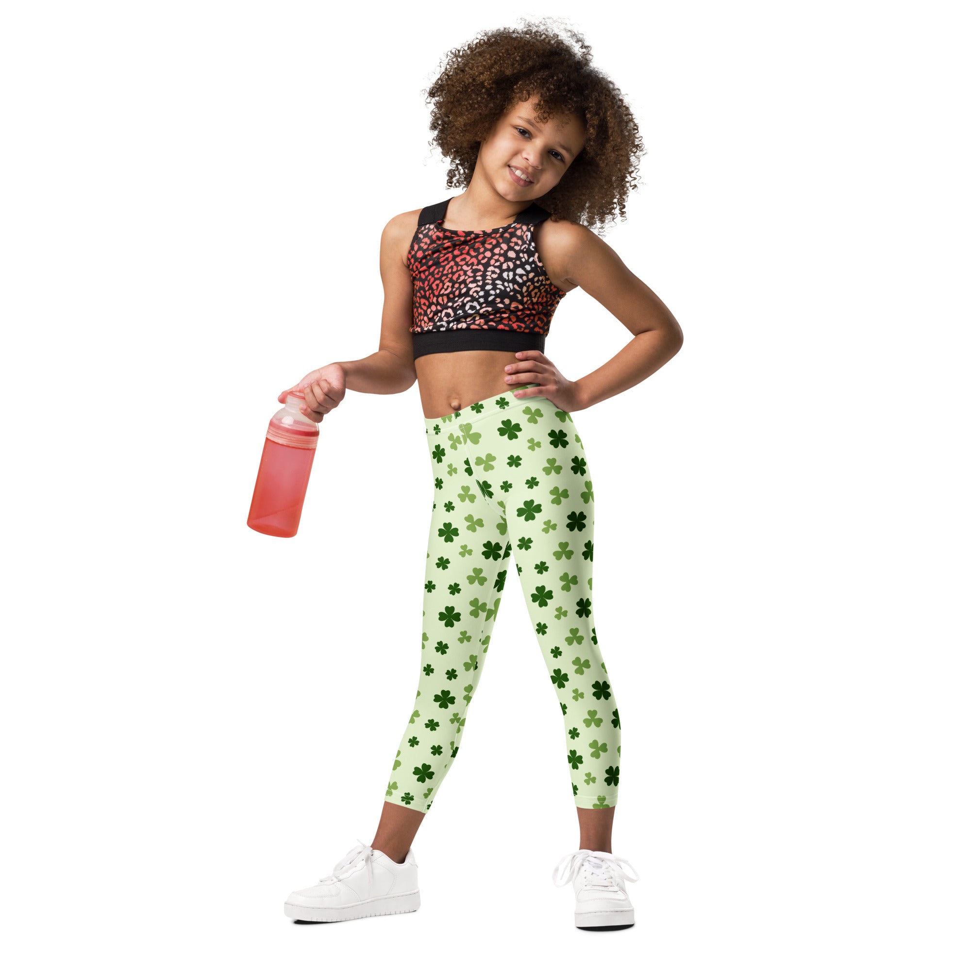 Girls light green buttery soft leggings with dark green four leaf clover shamrock pattern
