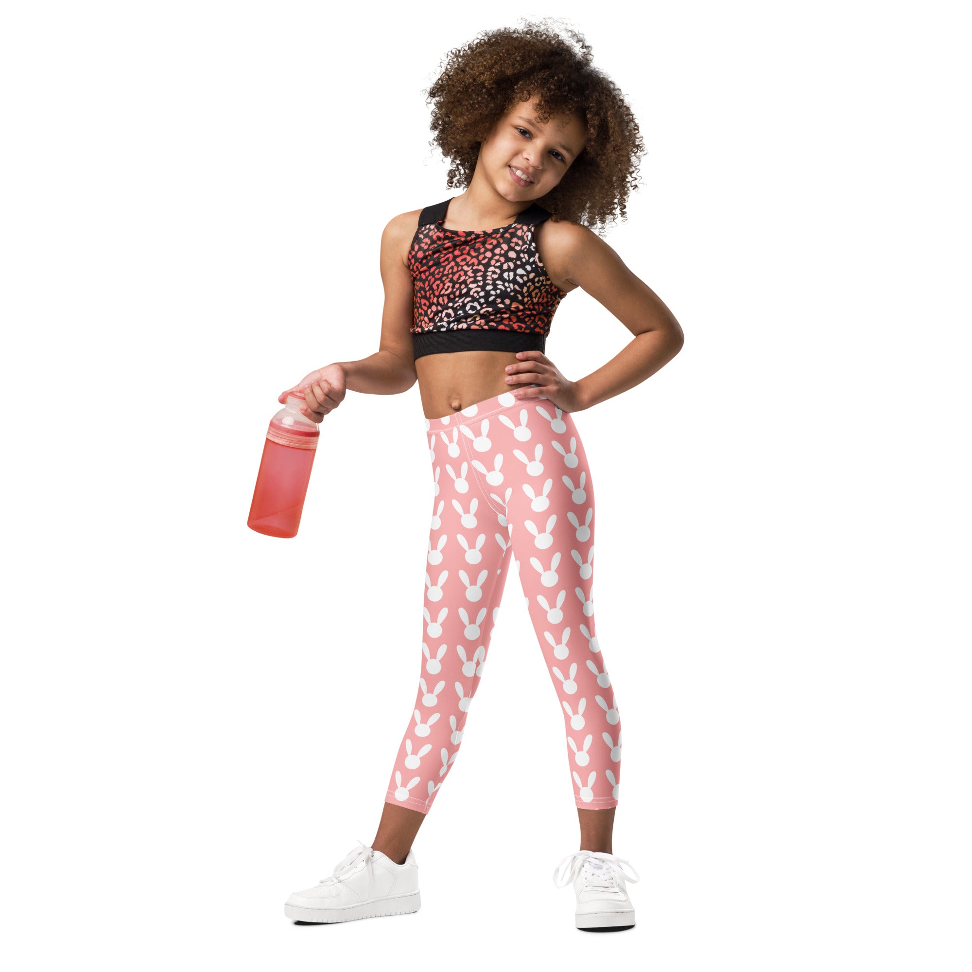 Girls pink buttery soft leggings with white bunny prints perfect for easter festivities