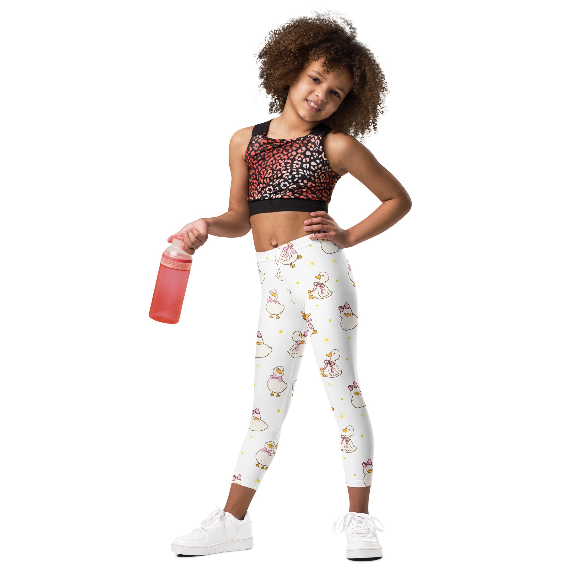 Girls Easter duck buttery soft white leggings with playful cartoon ducks, pink bows, and yellow polka dots pattern