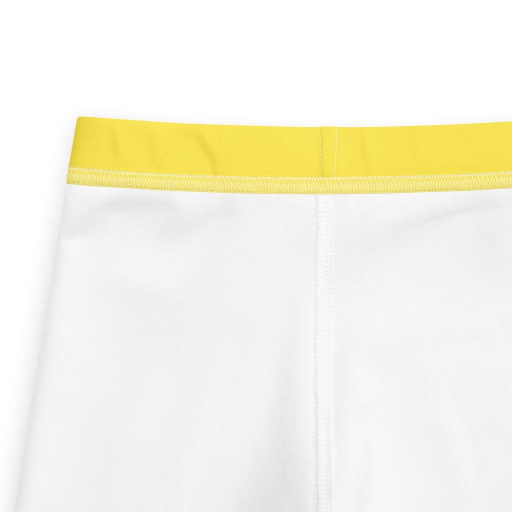 Kids buttery soft yellow leggings featuring white athletic shorts with a bright yellow elastic waistband