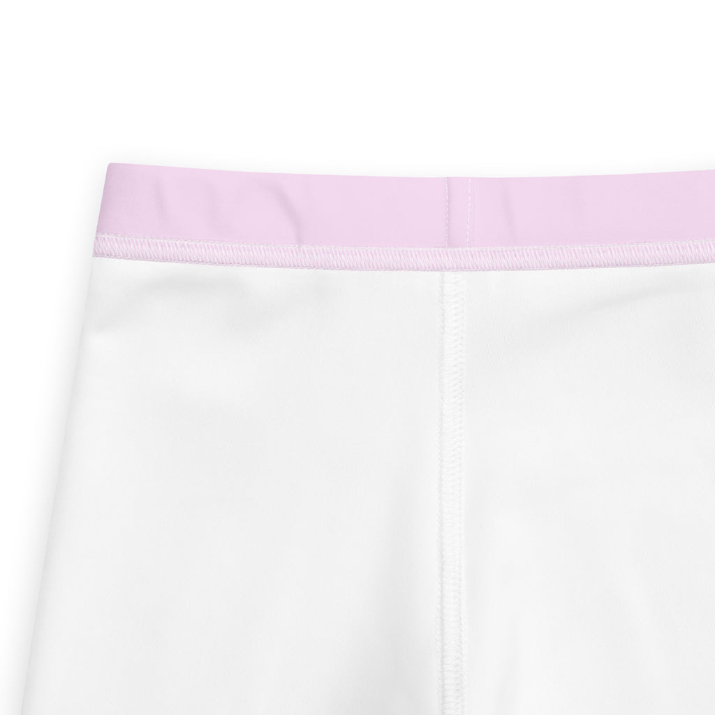 Girls buttery soft light pink leggings with a soft lavender elastic waistband made of comfortable fabric