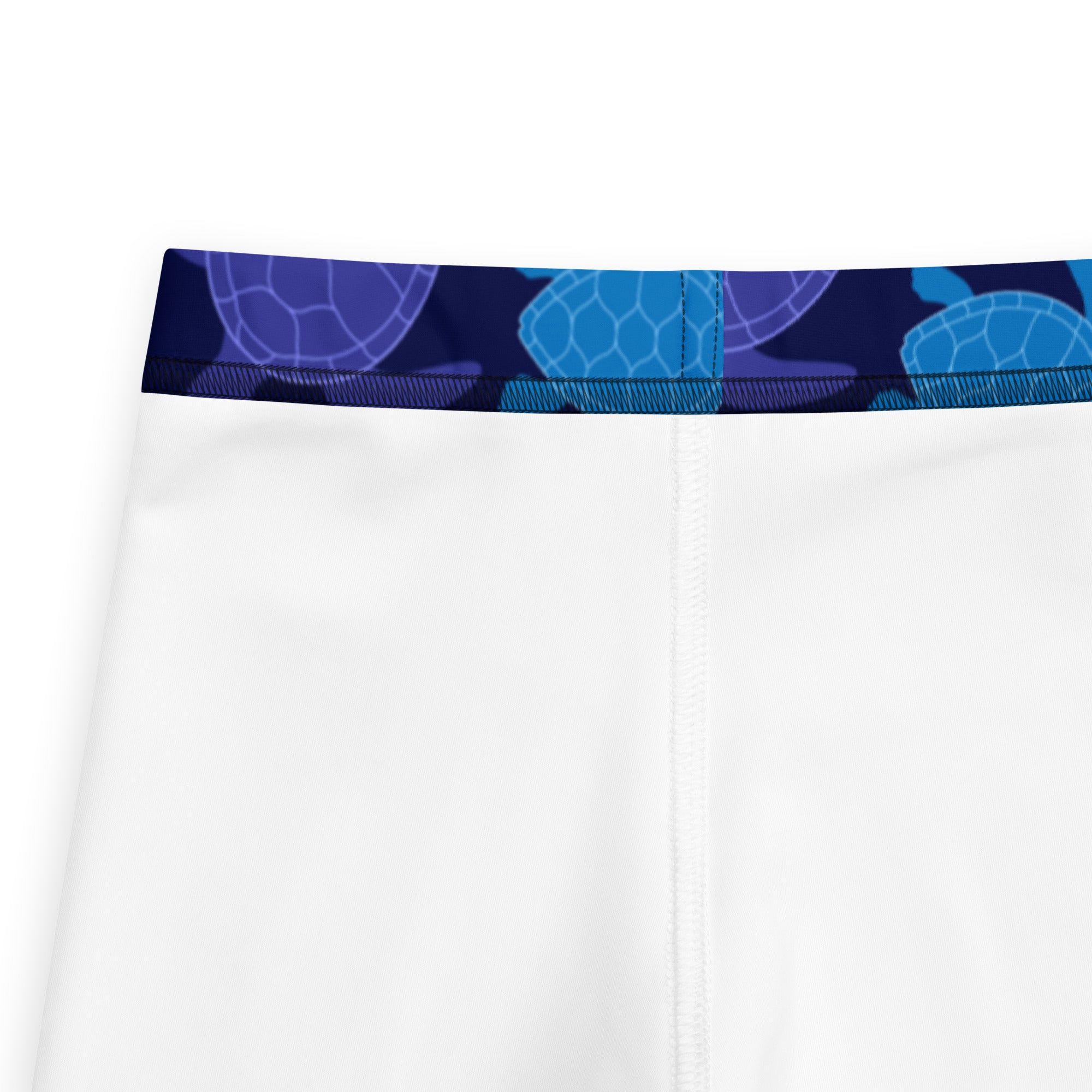 Girls purple sea turtle buttery soft leggings with white shorts and navy blue waistband featuring blue turtle pattern