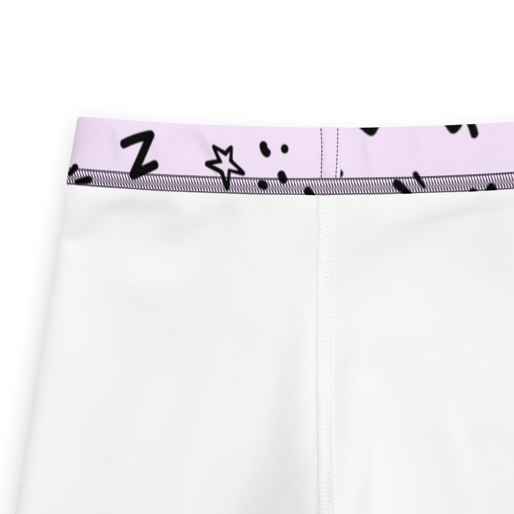 White buttery soft girl power kids leggings with light purple waistband and black doodle z stars and dots design