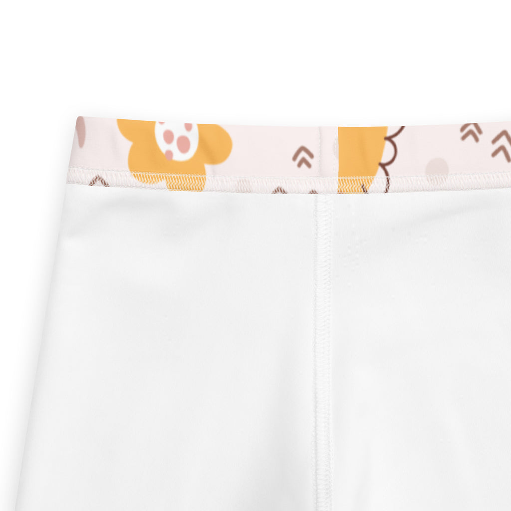 Girls floral dinosaur buttery soft white leggings with playful orange and brown floral waistband on light pink background