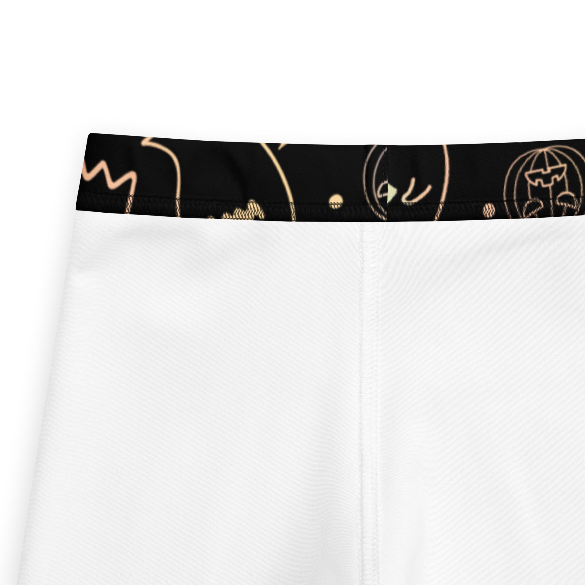 White athletic shorts with black waistband and gold halloween doodles designed for girls colorful neon buttery soft leggings