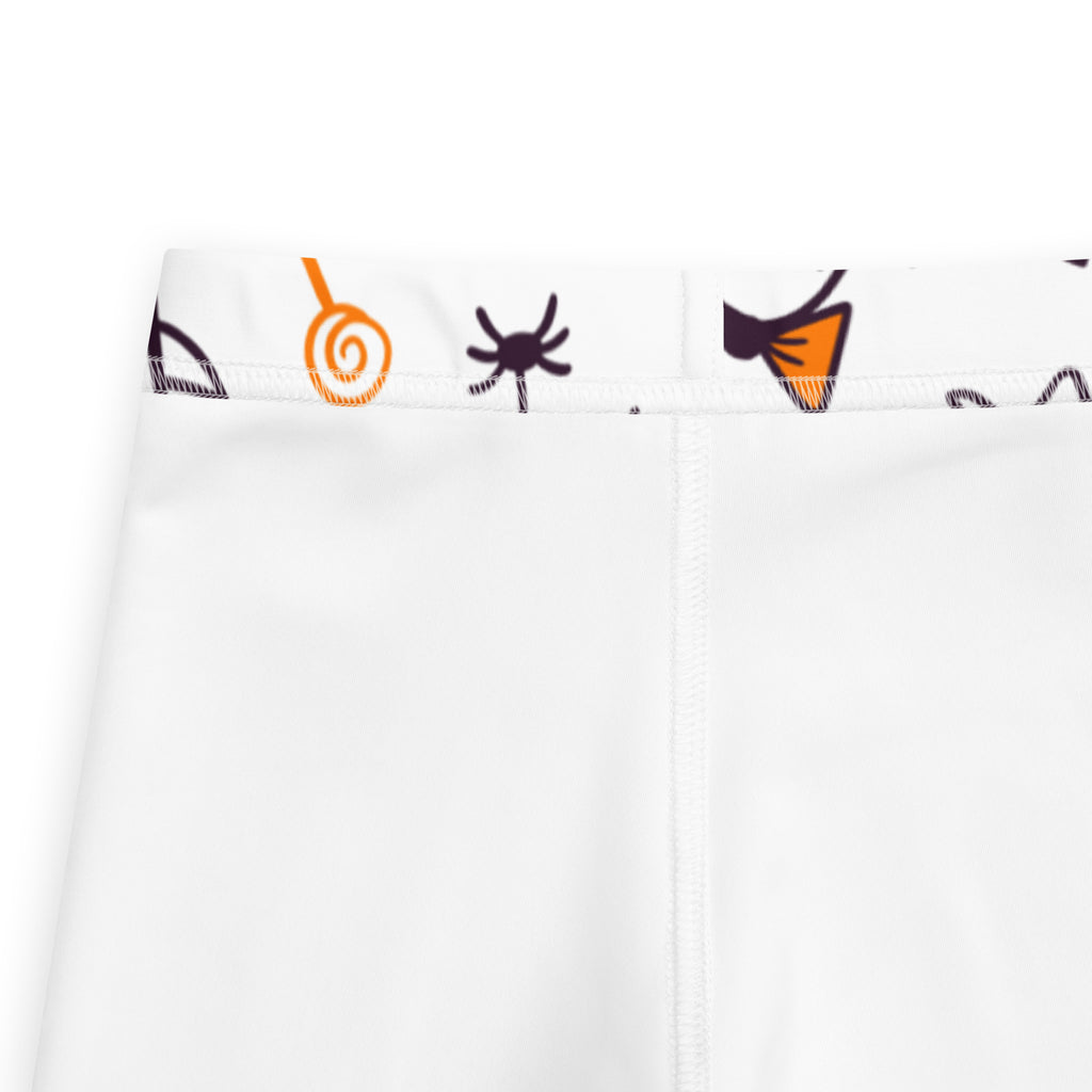 Girls cute ghost bow buttery soft white leggings with playful halloween-themed waistband of orange and black spiders and lollipops