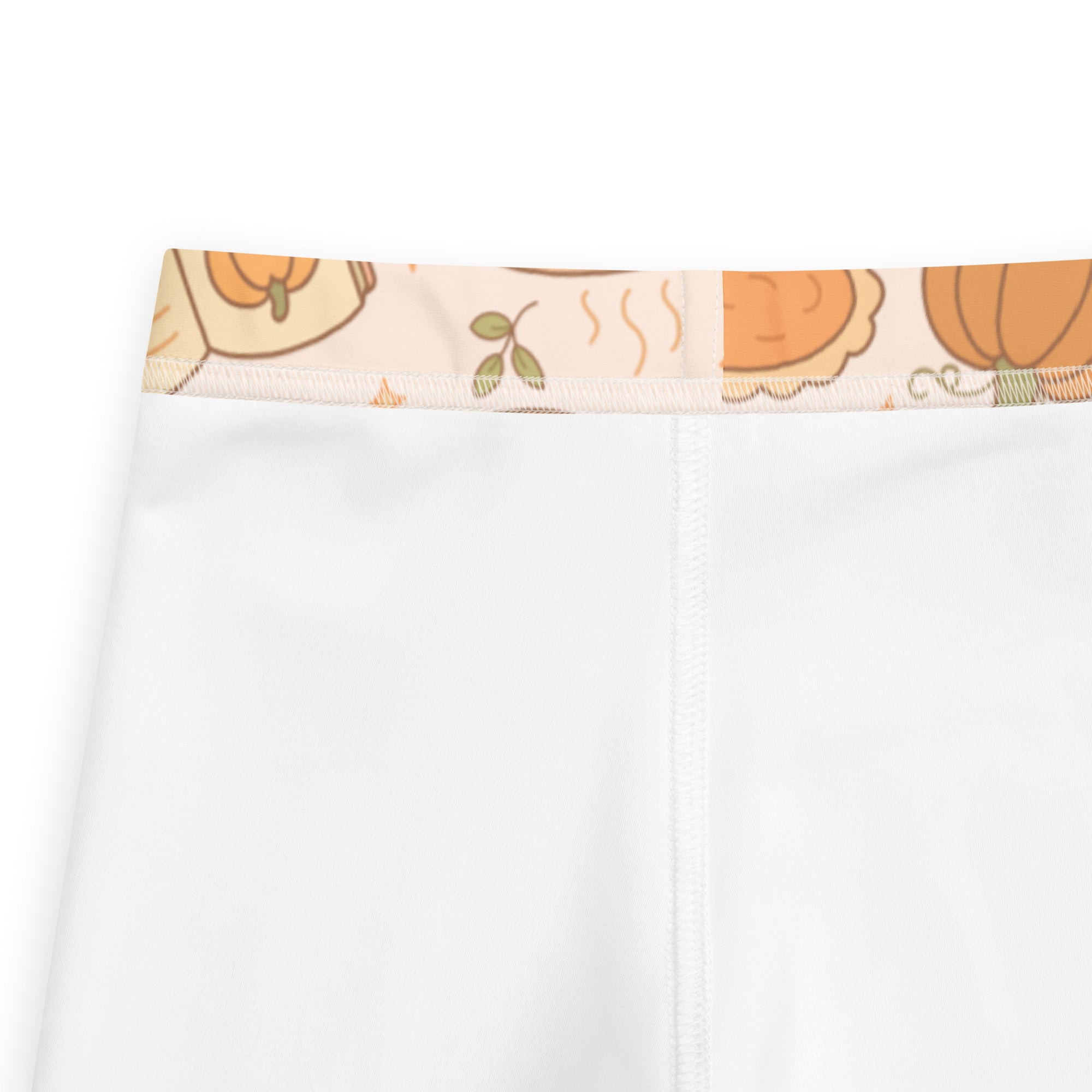 Kids pumpkin pie themed buttery soft white leggings with decorative waistband featuring cartoon pumpkins and autumn leaves