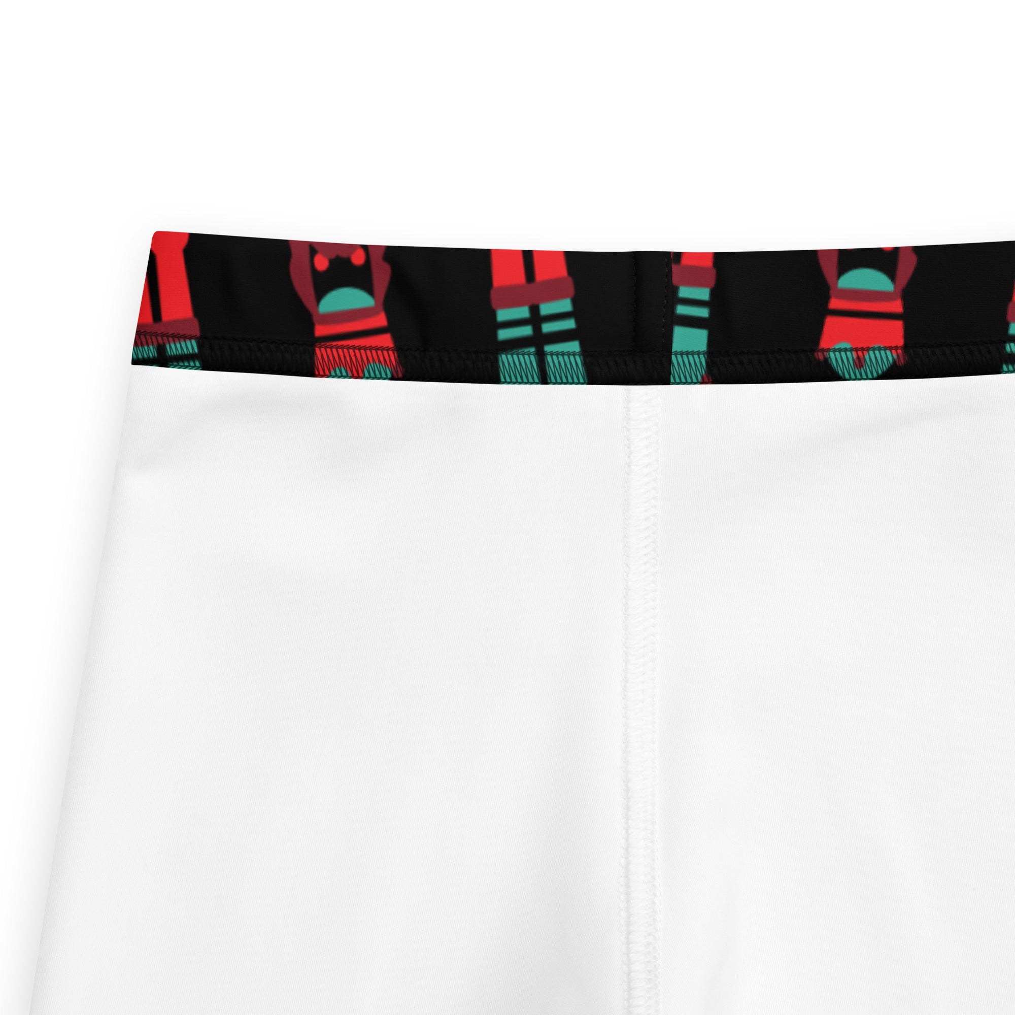 White girls nutcracker christmas buttery soft athletic shorts with black waistband and red teal figure pattern