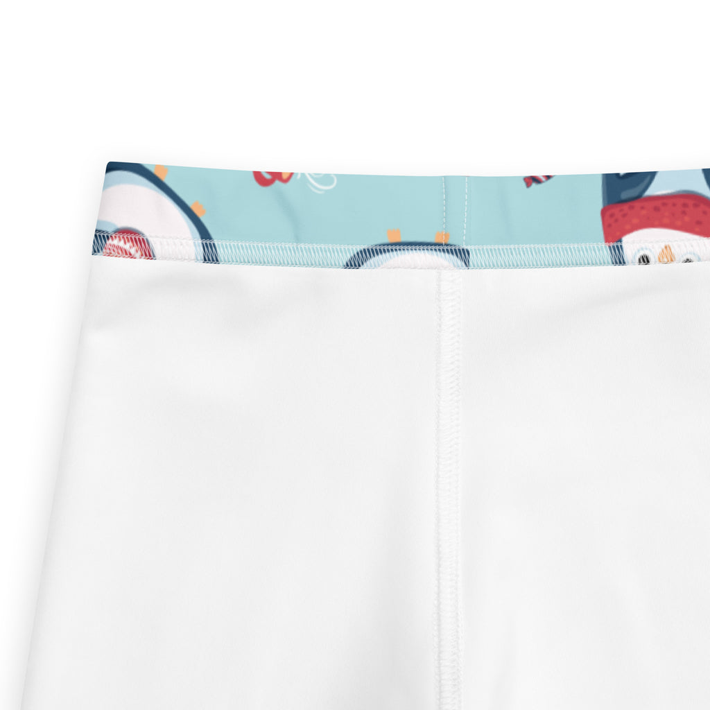 Girls cute penguin christmas buttery soft white leggings with light blue waistband featuring penguin and snowman pattern