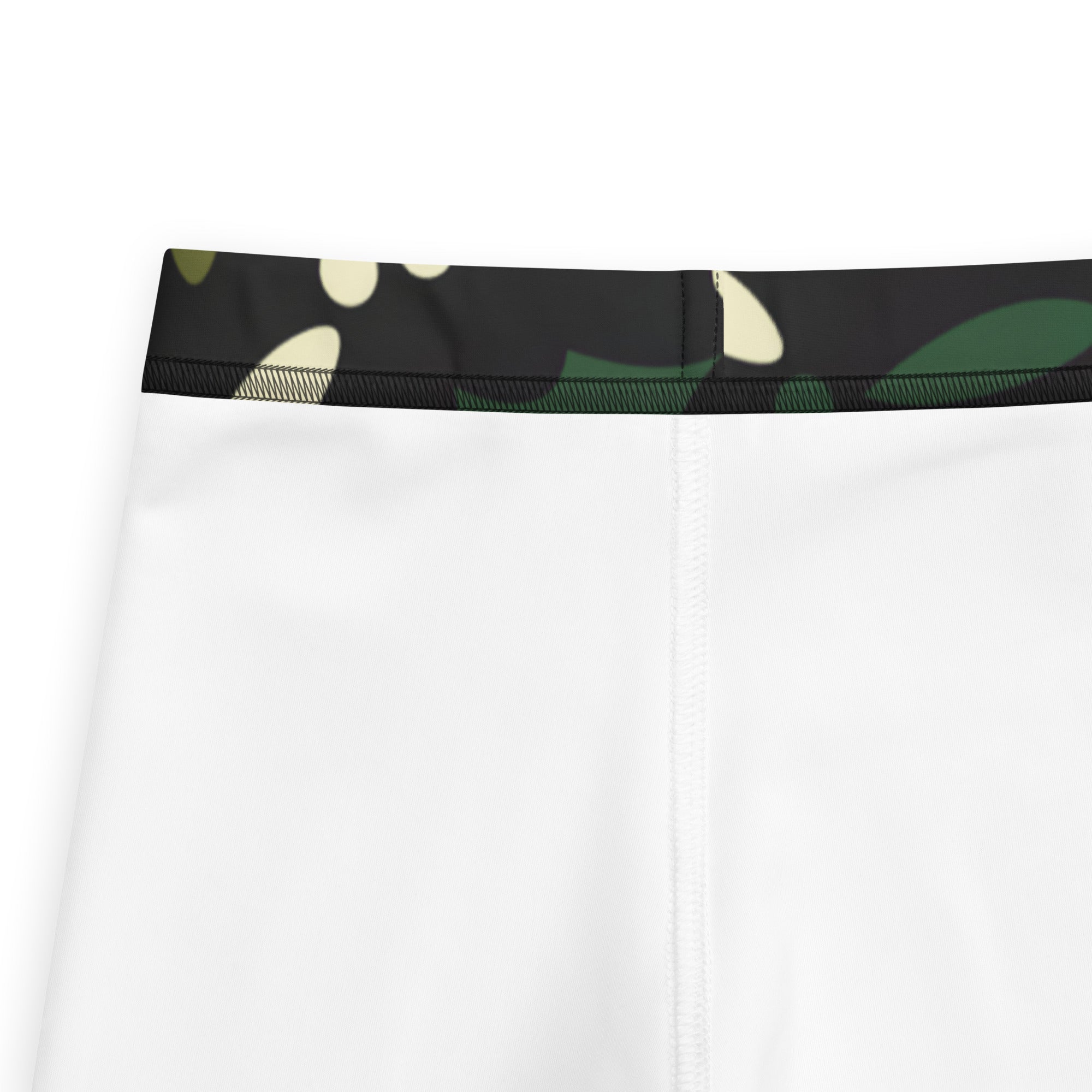 Kids holiday holly buttery soft leggings with white athletic shorts and black waistband with green beige abstract camo