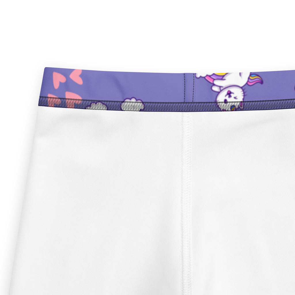 Girls purple caticorn buttery soft white leggings with a purple waistband featuring a cartoon unicorn and pink hearts