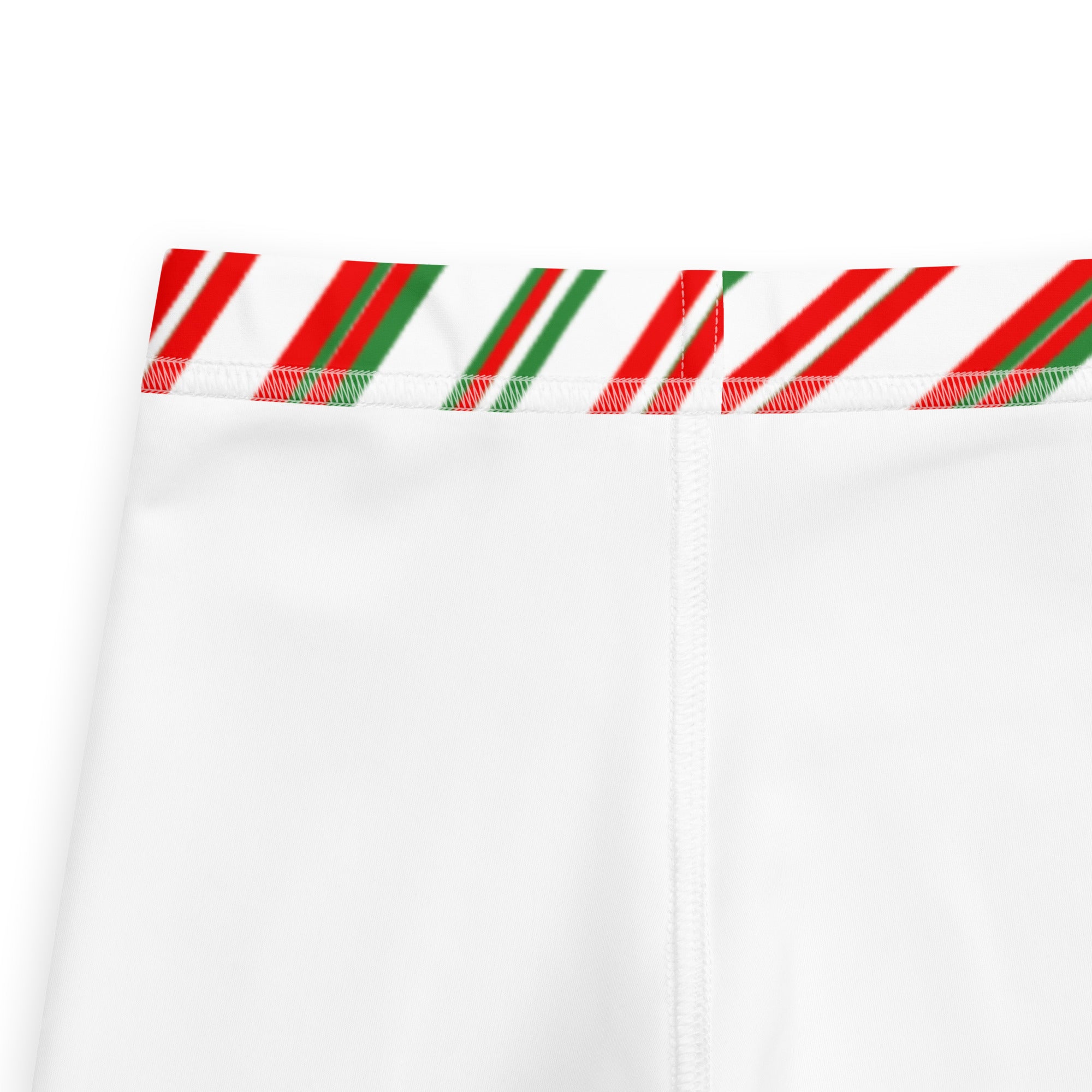 White kids leggings with a festive red and green peppermint candy cane striped waistband and buttery soft fabric