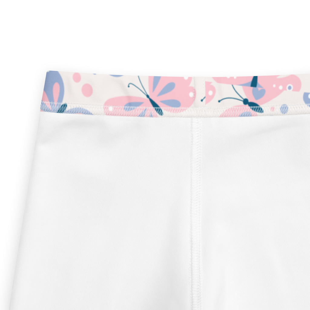 White girls leggings with decorative pink and blue butterfly waistband made of buttery soft fabric
