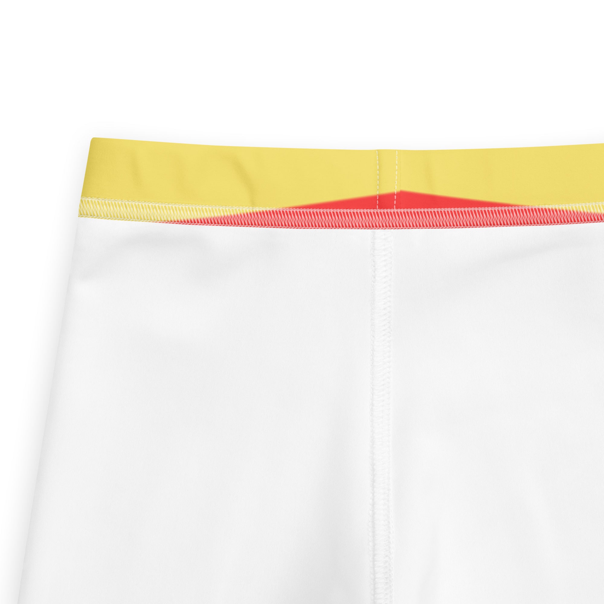 White athletic shorts with a bright yellow waistband and red trim paired with kids colorful striped butterfly leggings