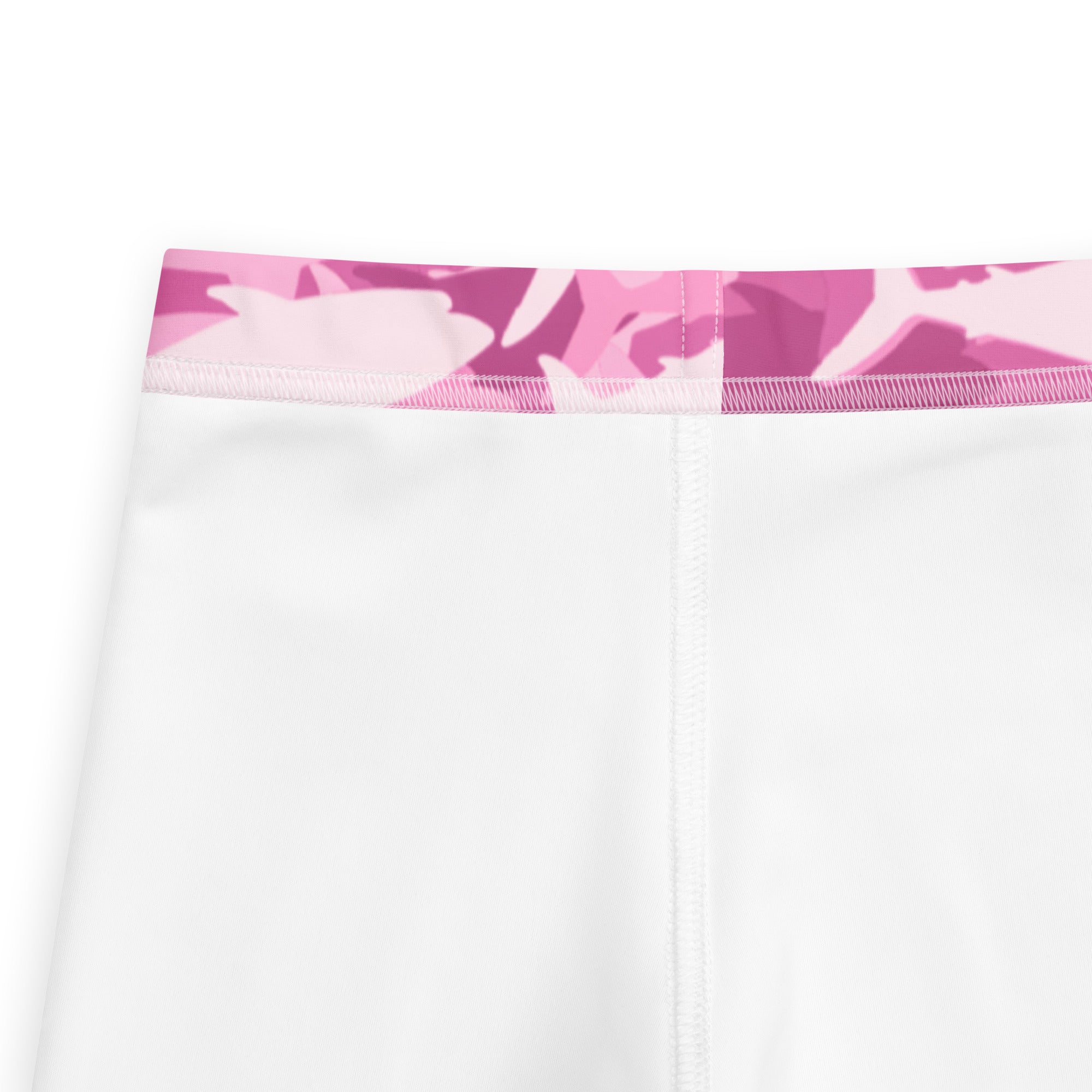 Girls pink shark buttery soft white leggings with a pink camouflage patterned waistband for comfortable wear