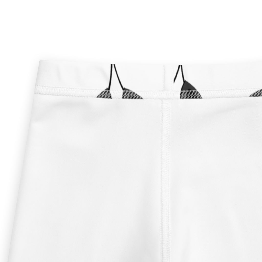 White athletic shorts with black triangular graphic print on waistband designed for kids black and white panda leggings