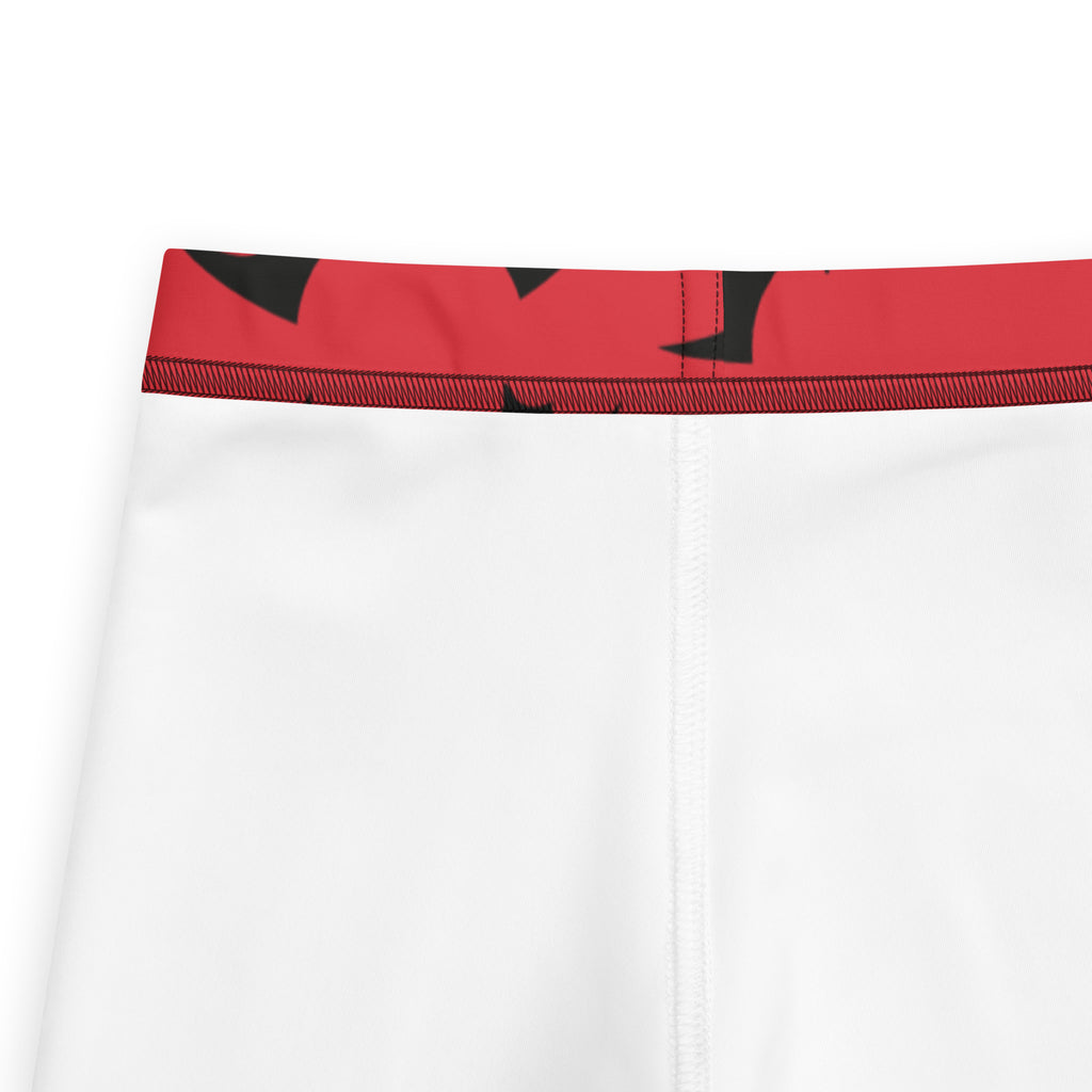 White athletic shorts with a red waistband and black abstract geometric patterns for kids buttery soft leggings