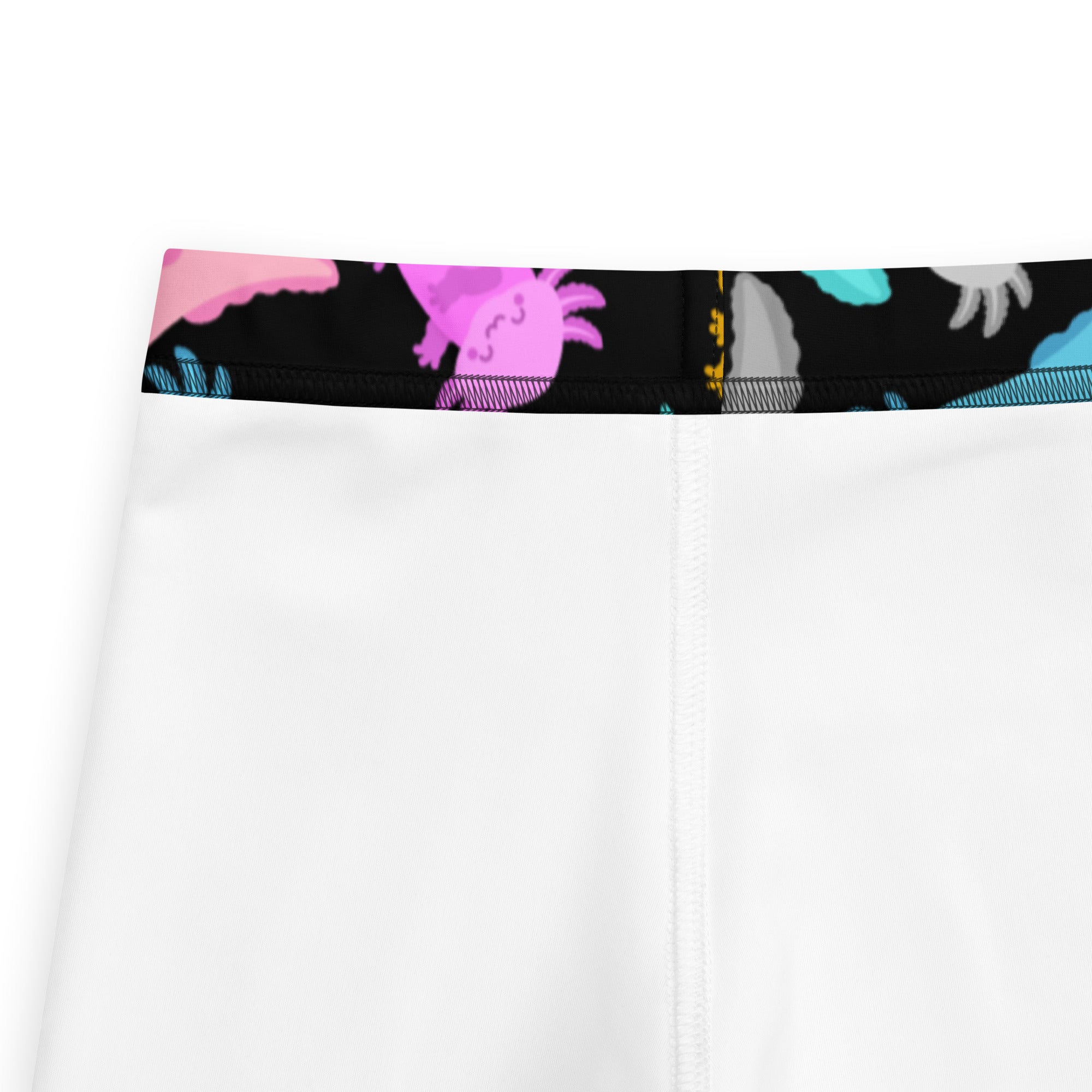 White kids leggings with colorful cartoon axolotl pattern on waistband buttery soft fabric