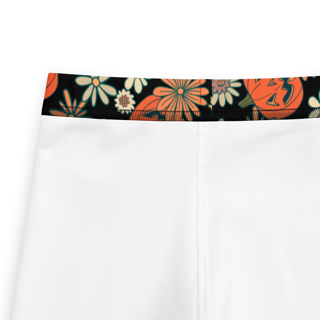 Kids vintage halloween pumpkin floral buttery soft white leggings with black waistband and orange cream flowers
