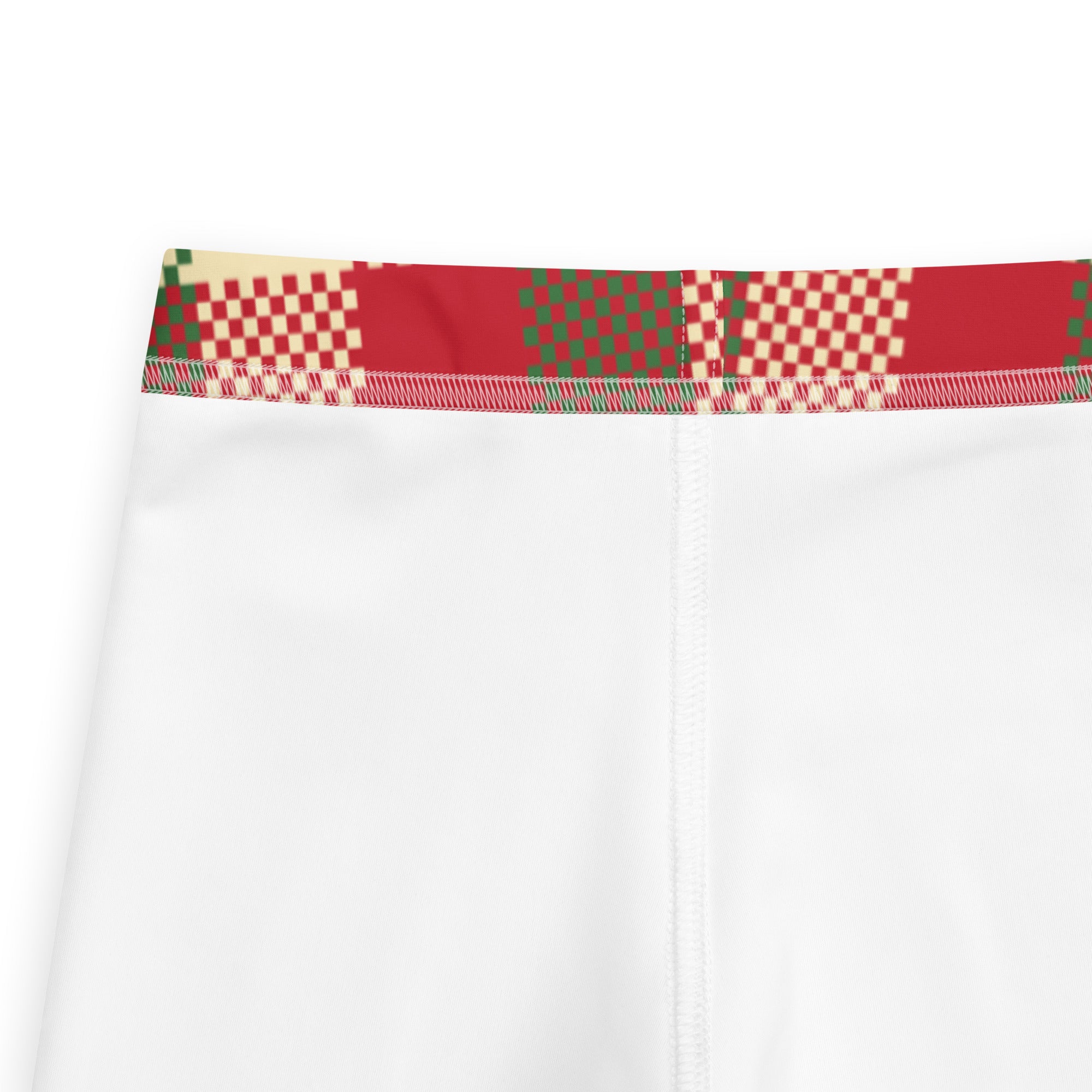 Kids christmas plaid buttery soft leggings in white with a red green and cream pixelated checkered waistband