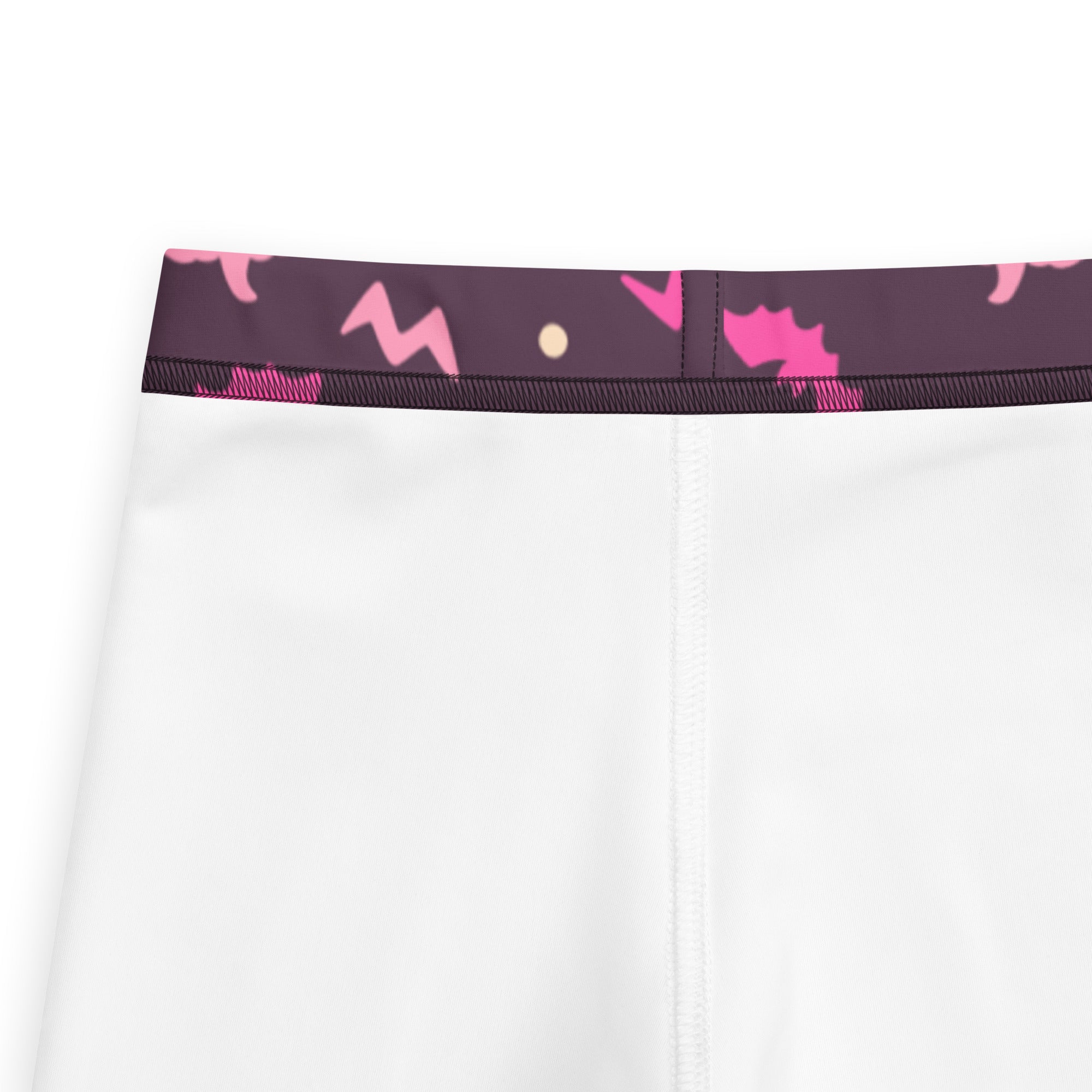 Girls purple and pink halloween buttery soft leggings with white fabric and dark purple waistband with pink lightning bolt patterns