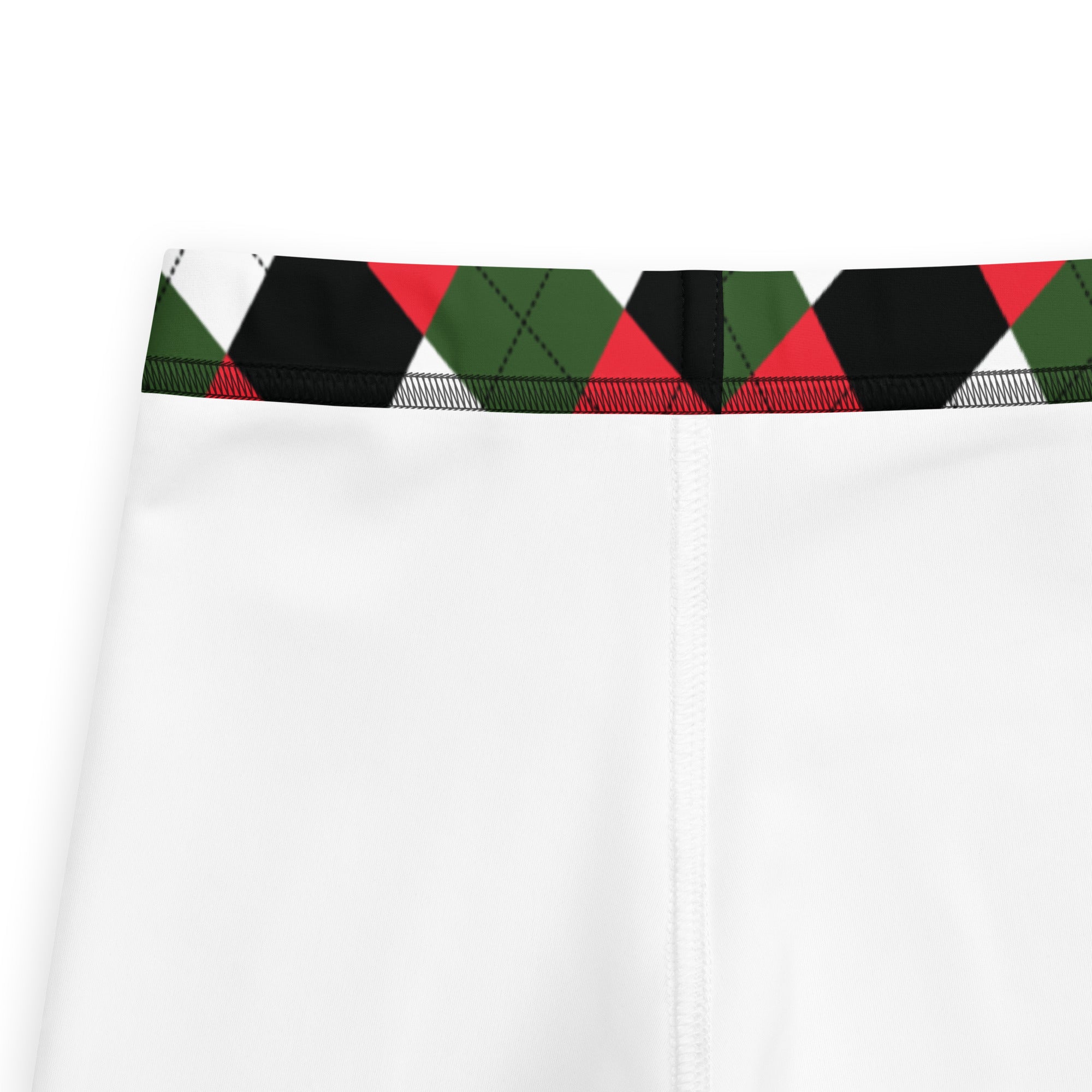 Kids red and green argyle buttery soft leggings with white athletic shorts featuring a bold argyle waistband
