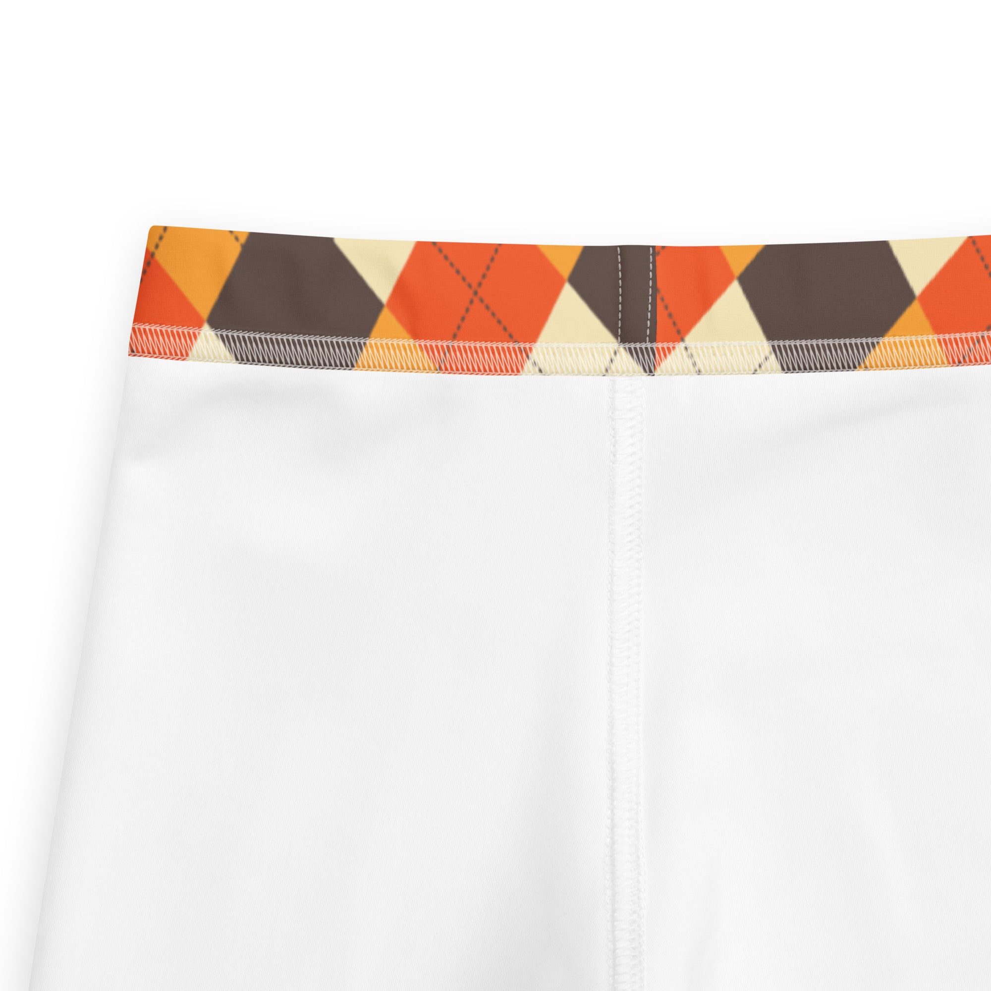 Kids fall argyle buttery soft leggings featuring white athletic shorts with an orange brown cream argyle waistband