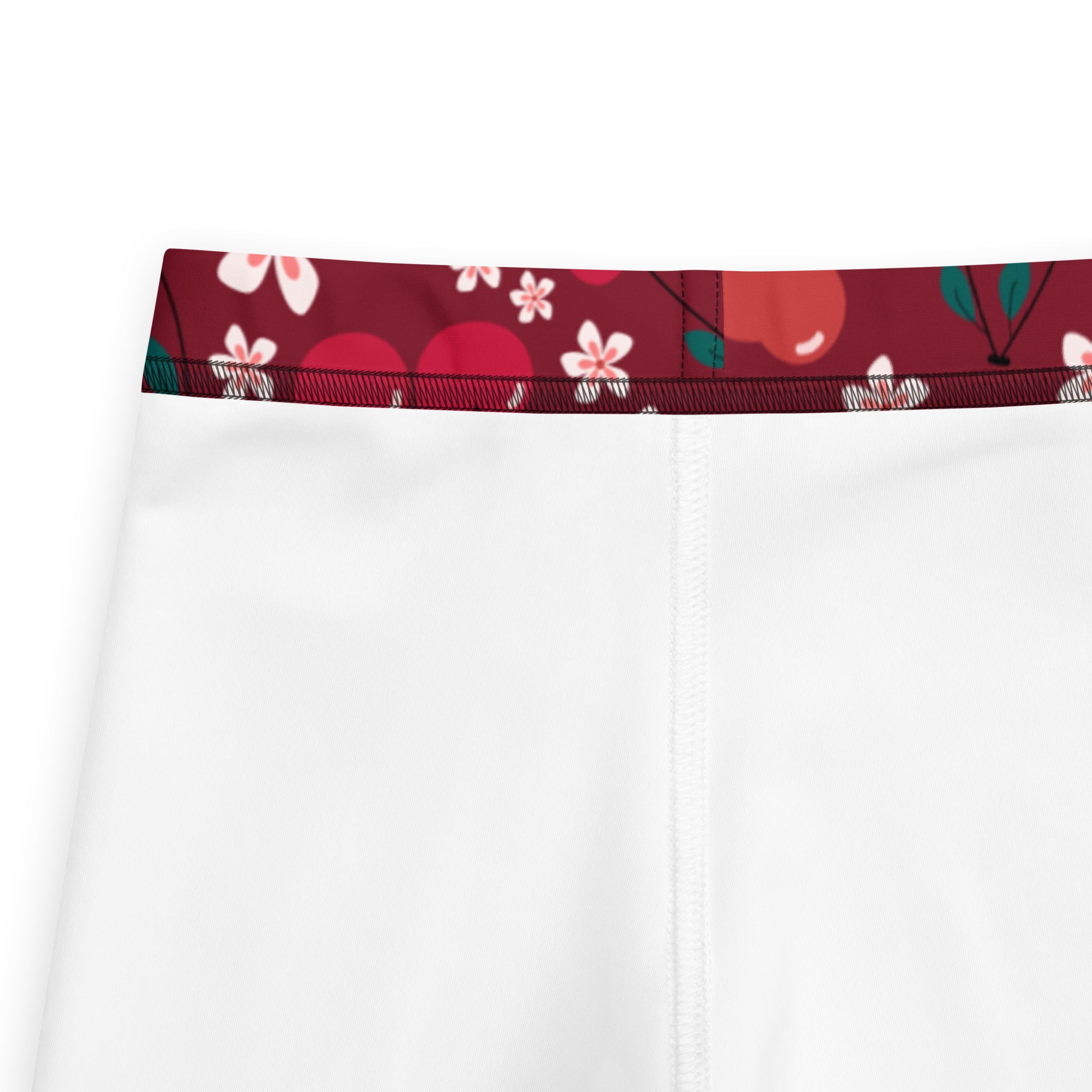 White girls cherry blossom print buttery soft leggings with maroon waistband featuring pink flowers and red motifs