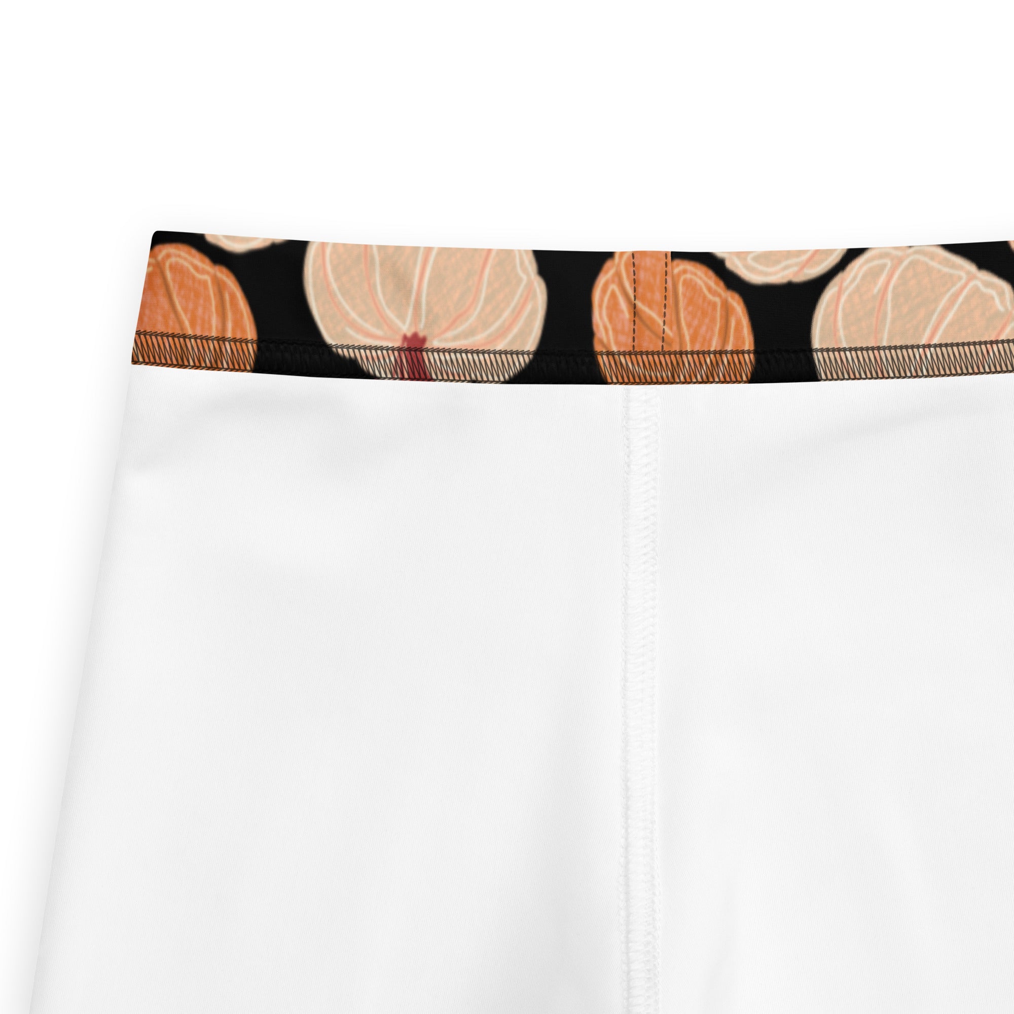 White kids fall pumpkins buttery soft leggings with black waistband and orange beige pumpkin pattern