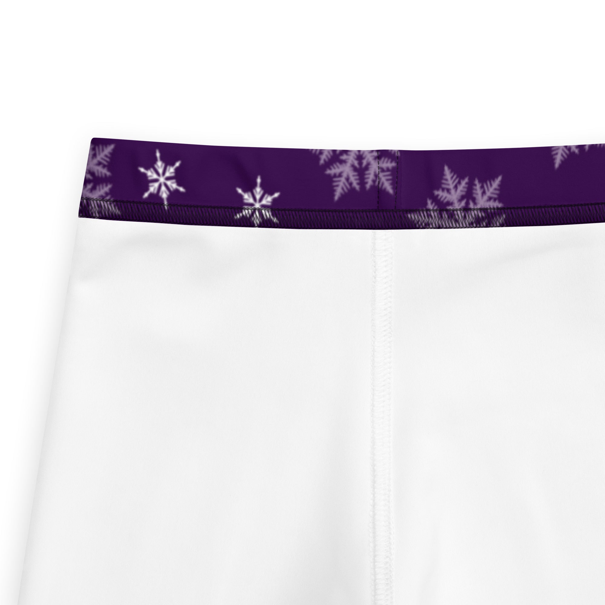 Girls purple snowflake buttery soft white athletic leggings with a purple waistband featuring white snowflake patterns