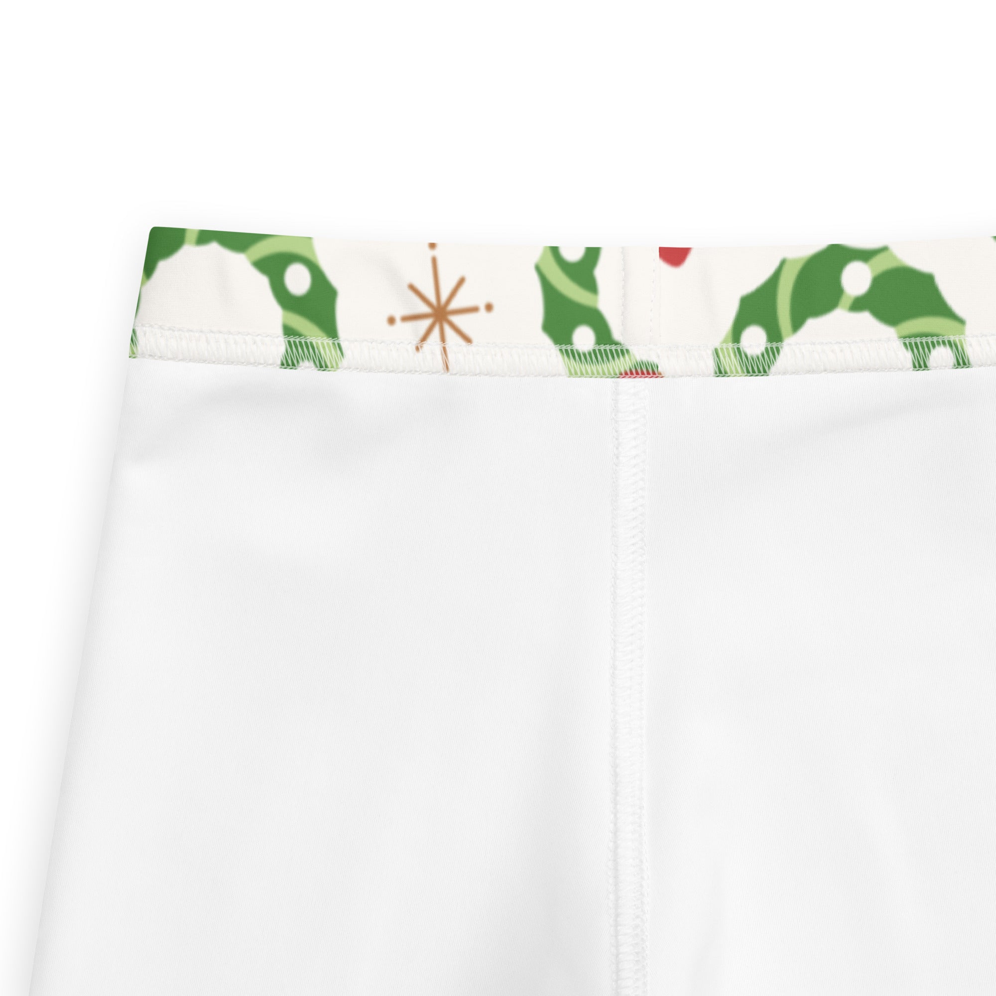 Kids holiday wreath buttery soft white leggings with green caterpillar and star pattern along the waistband