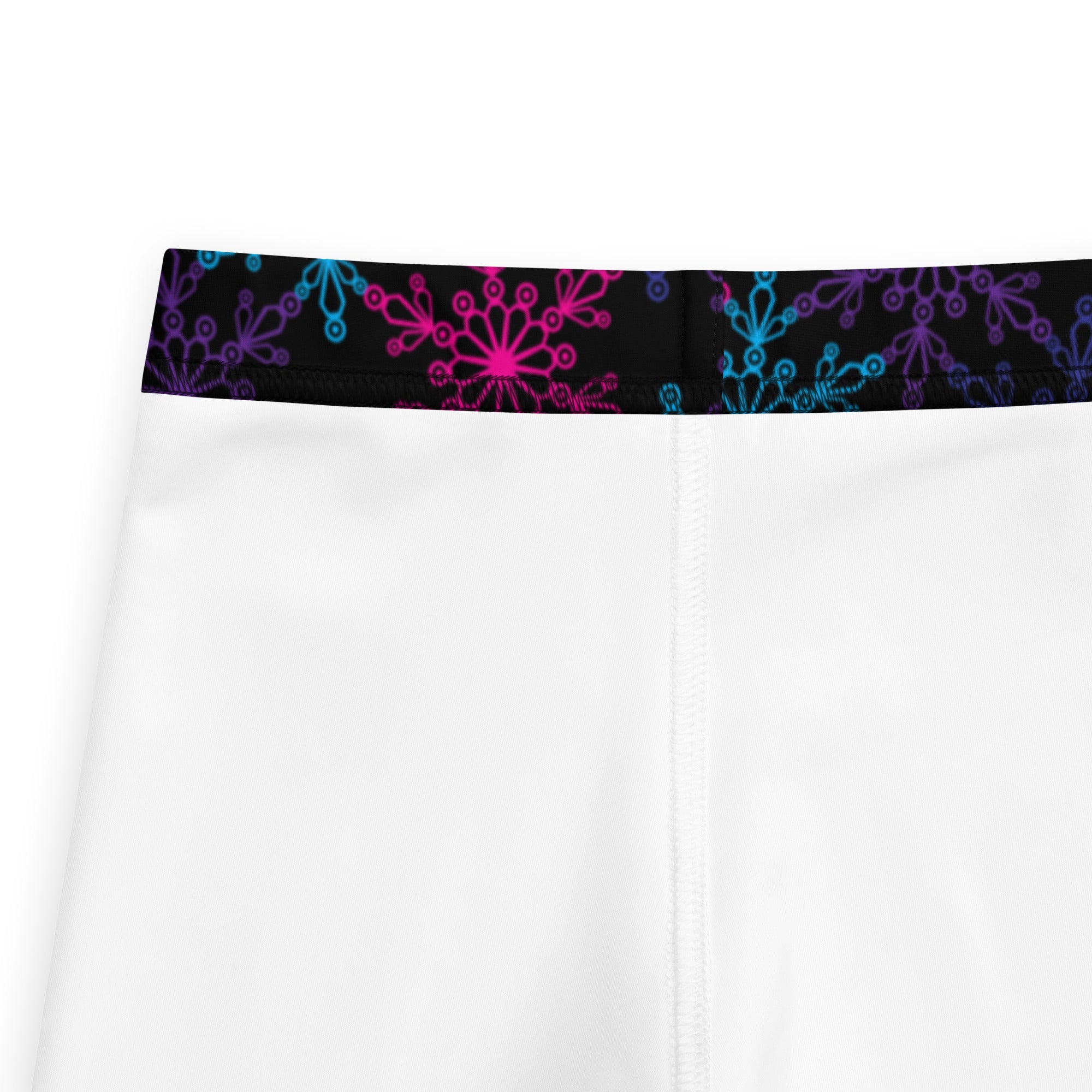 White skirt with black waistband and neon pink blue floral patterns paired with girls neon snowflake buttery soft leggings
