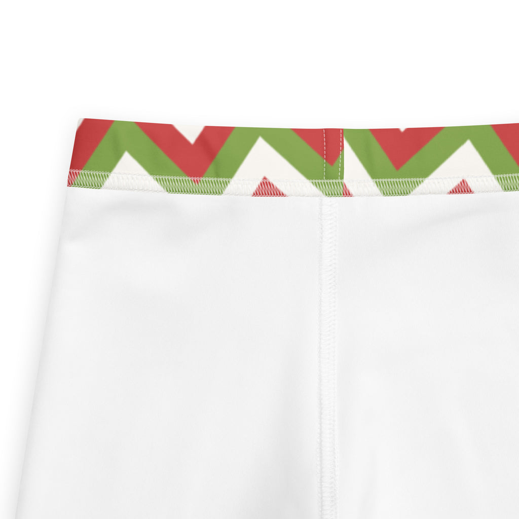 White kids christmas chevron buttery soft leggings with festive red and green zigzag waistband pattern